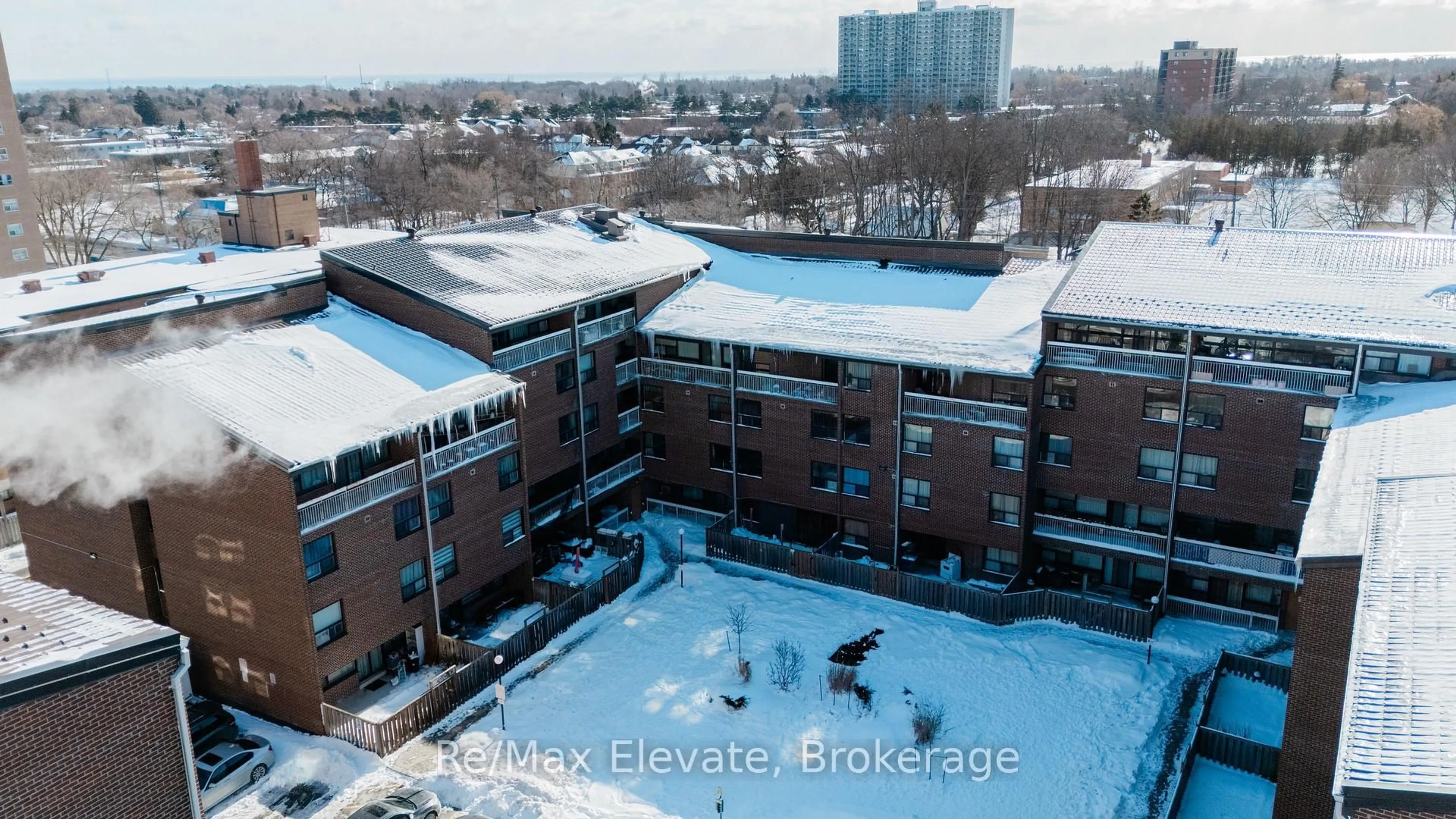 A pic from outside/outdoor area/front of a property/back of a property/a pic from drone, city buildings view from balcony for 4060 Lawrence Ave #204, Toronto Ontario M1E 4V4