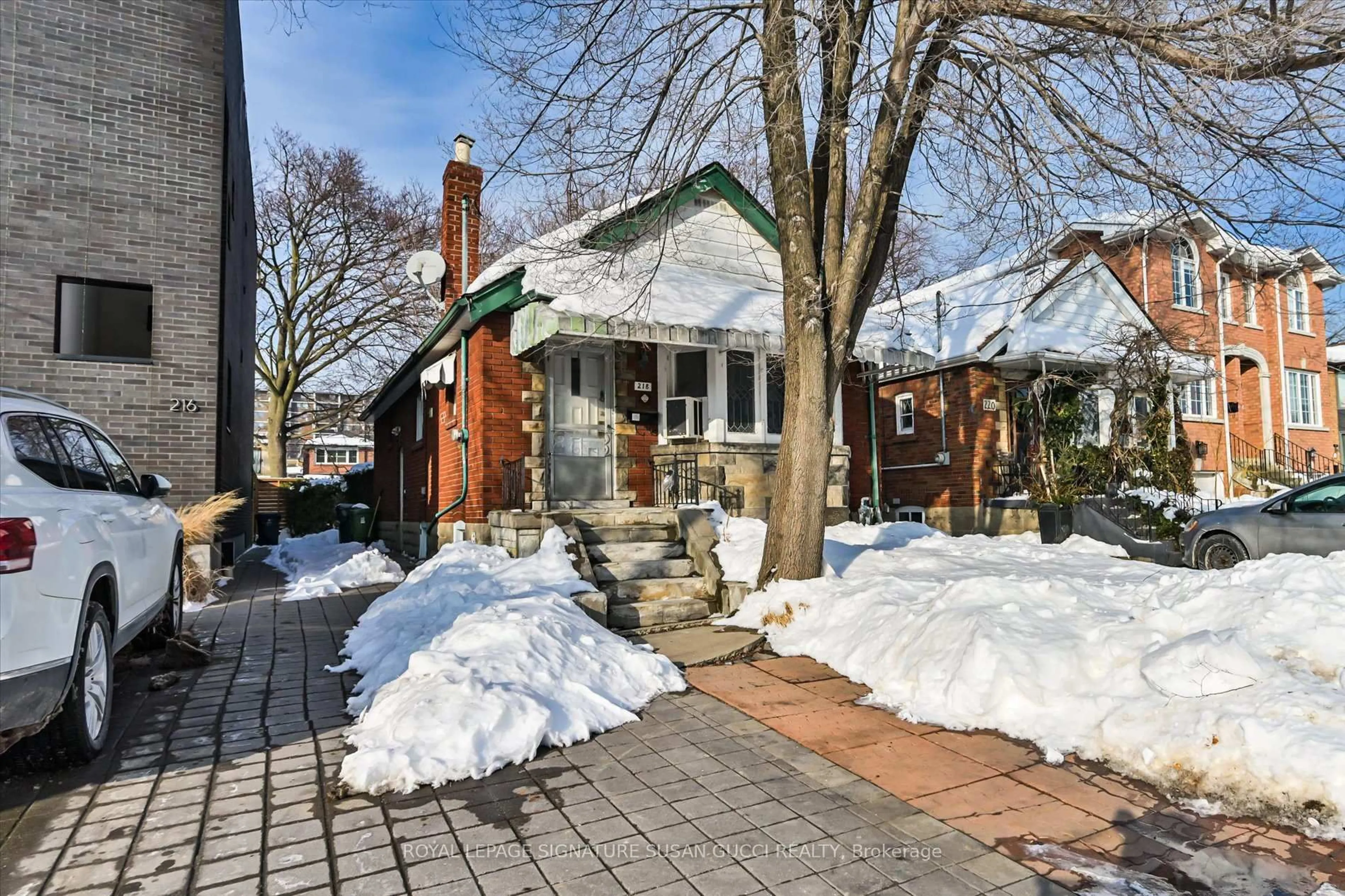 Home with brick exterior material, street for 218 Floyd Ave, Toronto Ontario M4J 2J1