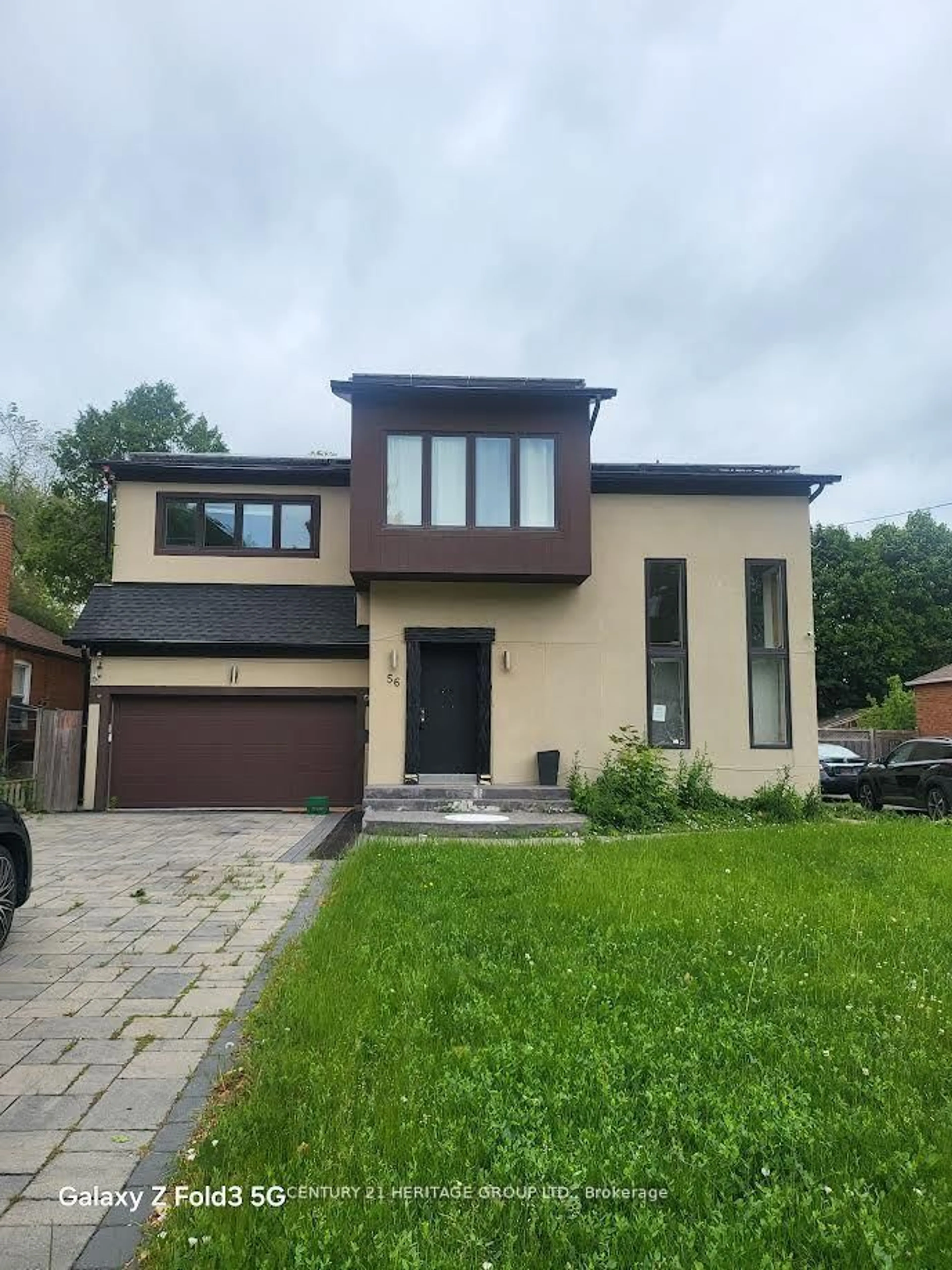 Home with brick exterior material, street for 56 Martindale Rd, Toronto Ontario M1M 2C1