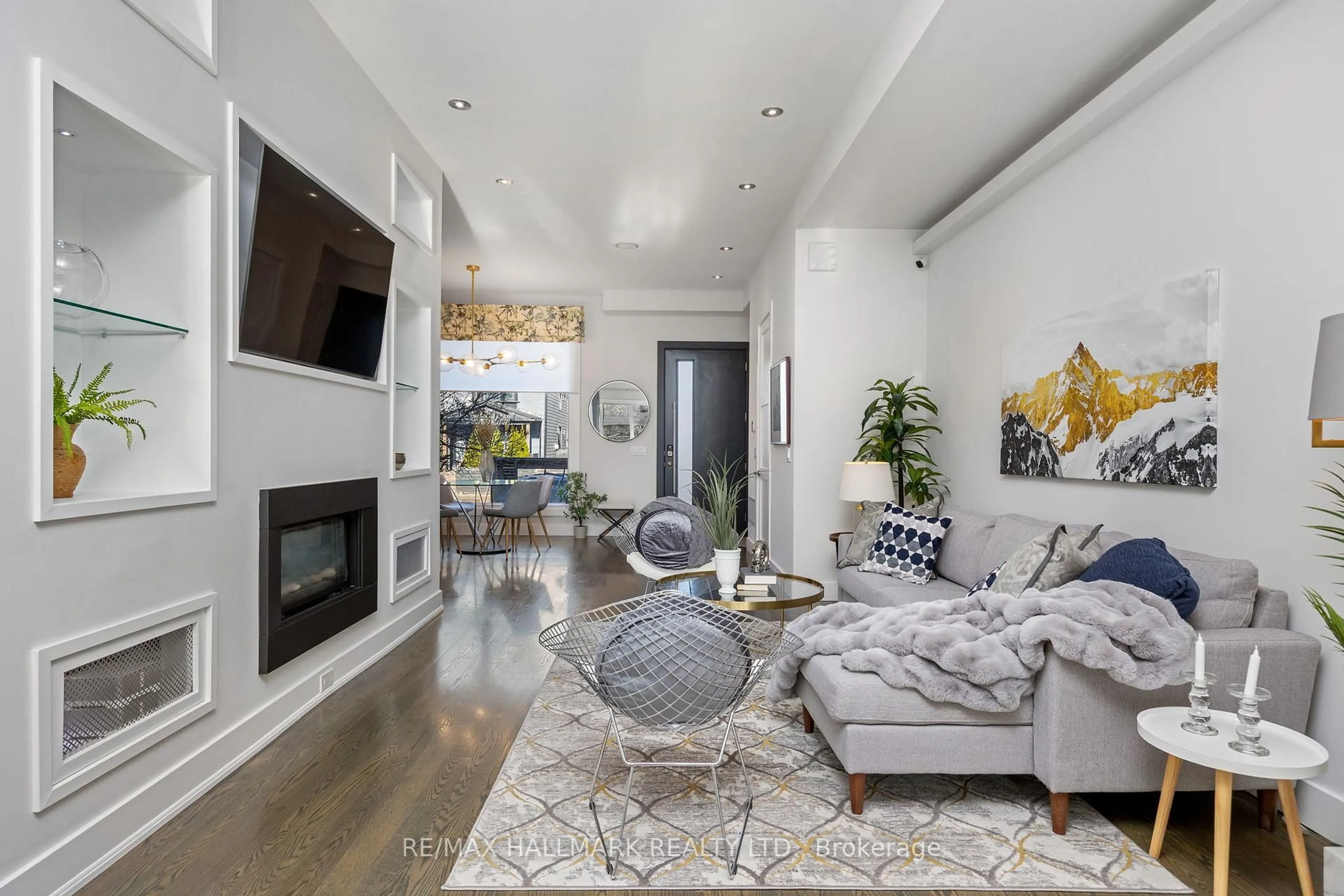 Living room with furniture, unknown for 1549 Dundas St, Toronto Ontario M4L 1K6