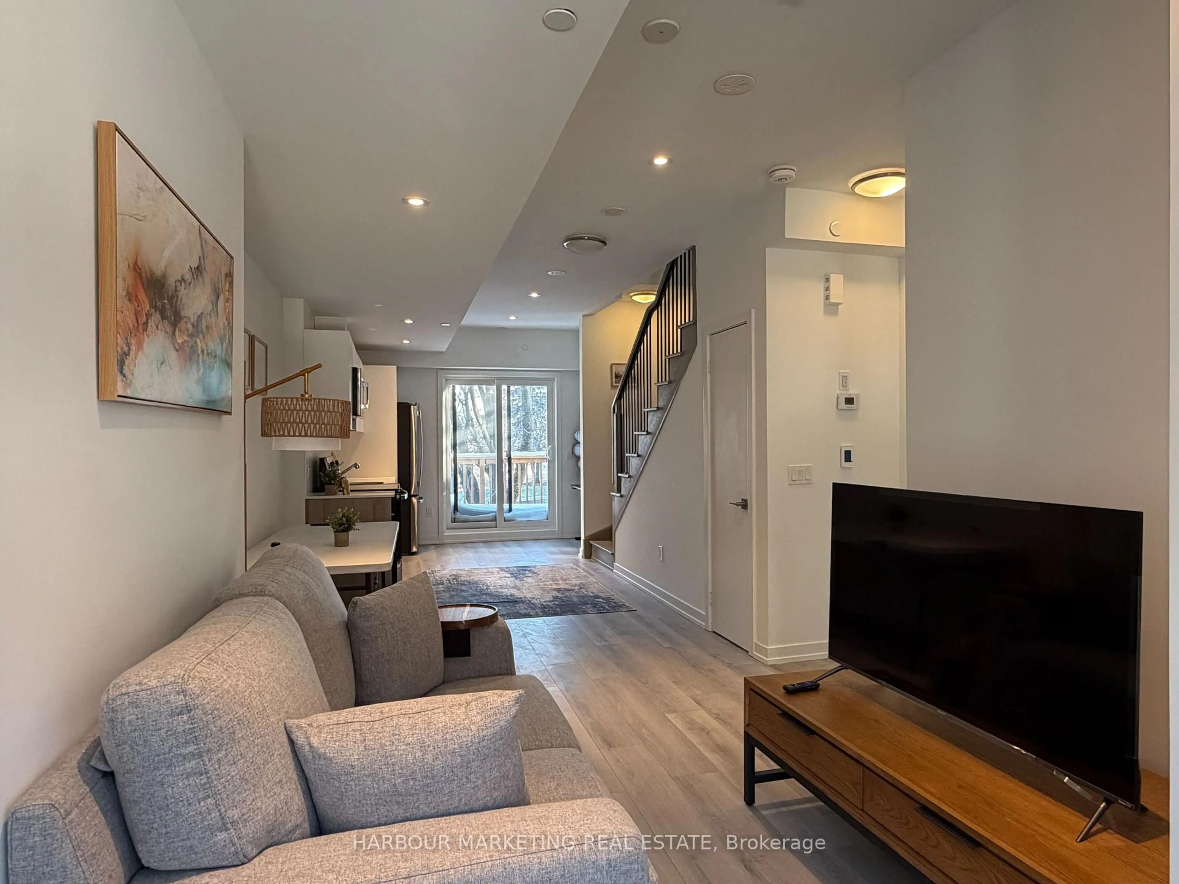 Living room with furniture, unknown for 23 Calamint Lane, Toronto Ontario M1W 2H1