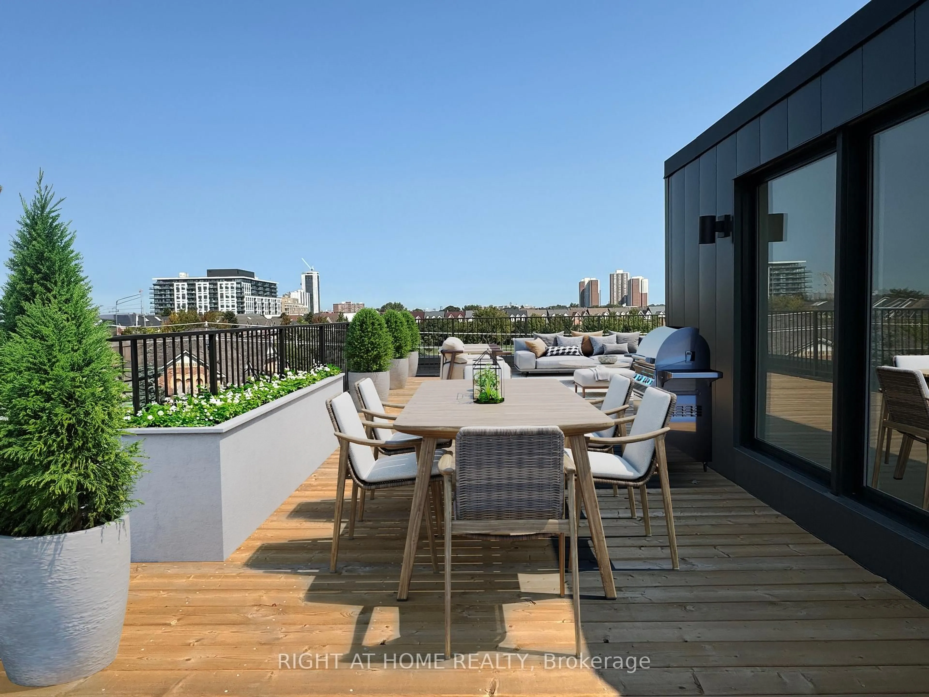 Patio, city buildings view from balcony for 2343 Gerrard St #Sky, Toronto Ontario M4E 2E6