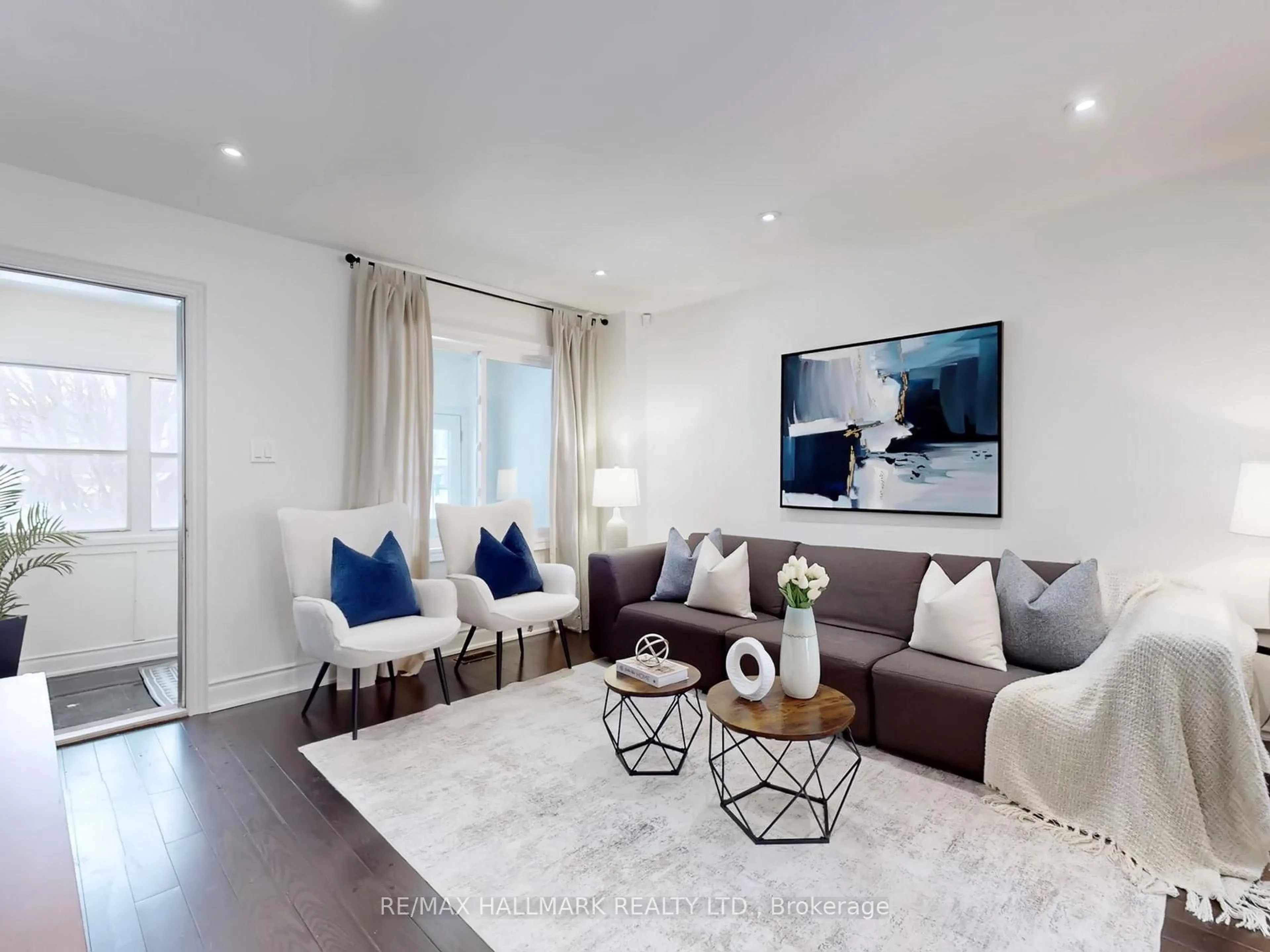 Living room with furniture, unknown for 115 Hiltz Ave, Toronto Ontario M4L 2N7