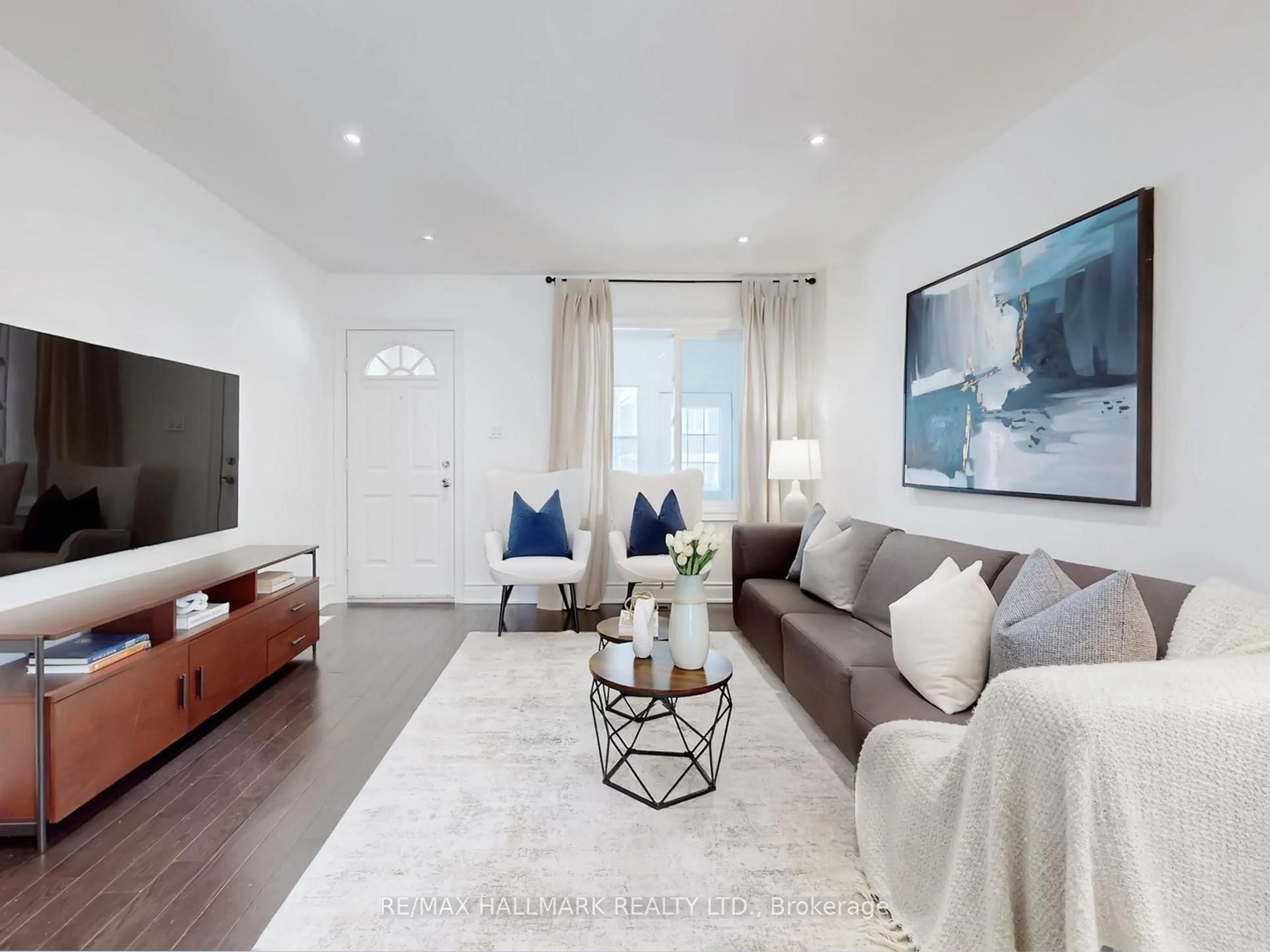 Living room with furniture, unknown for 115 Hiltz Ave, Toronto Ontario M4L 2N7