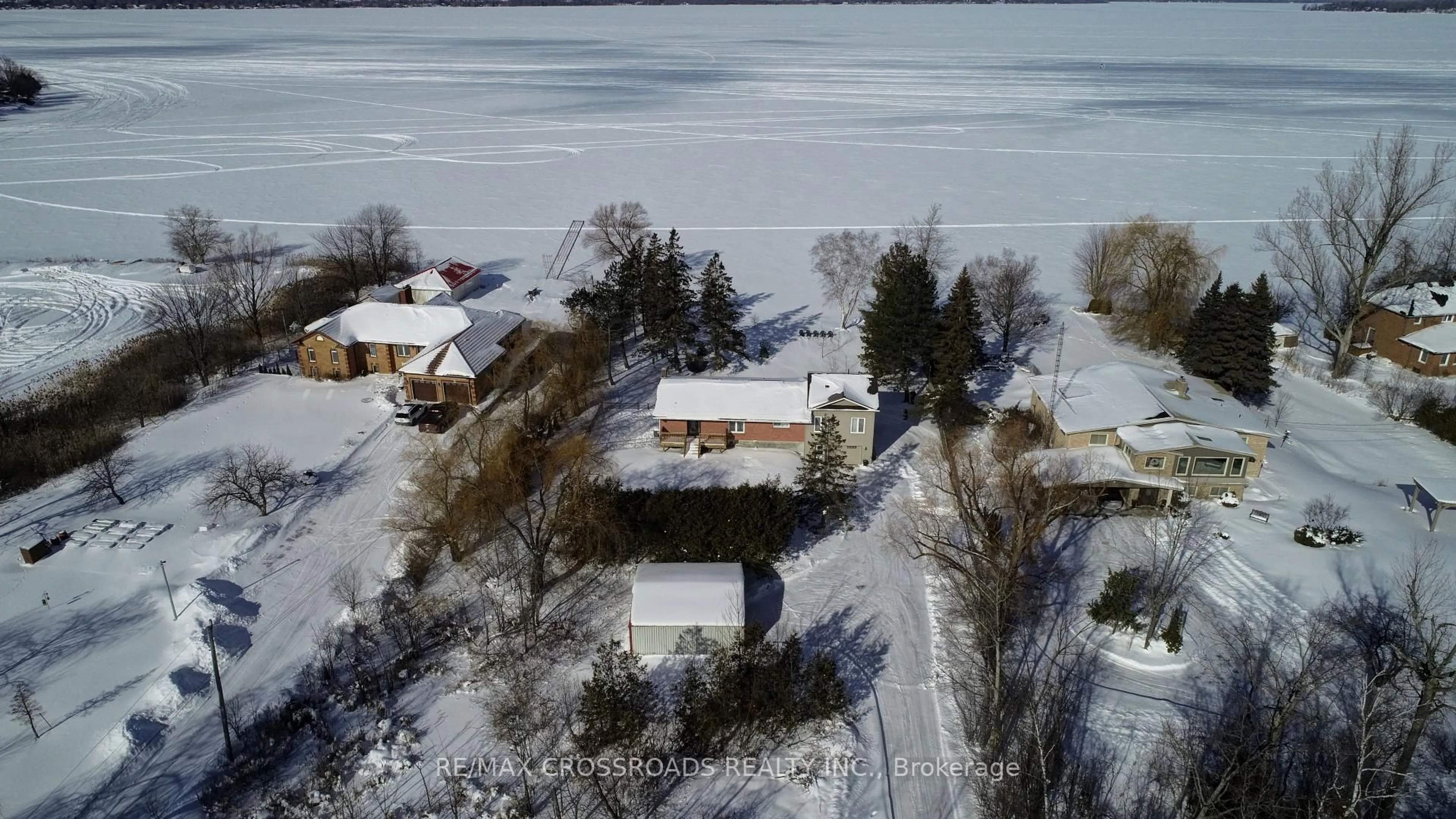 A pic from outside/outdoor area/front of a property/back of a property/a pic from drone, water/lake/river/ocean view for 8 Williams Point Rd, Scugog Ontario L0B 1E0