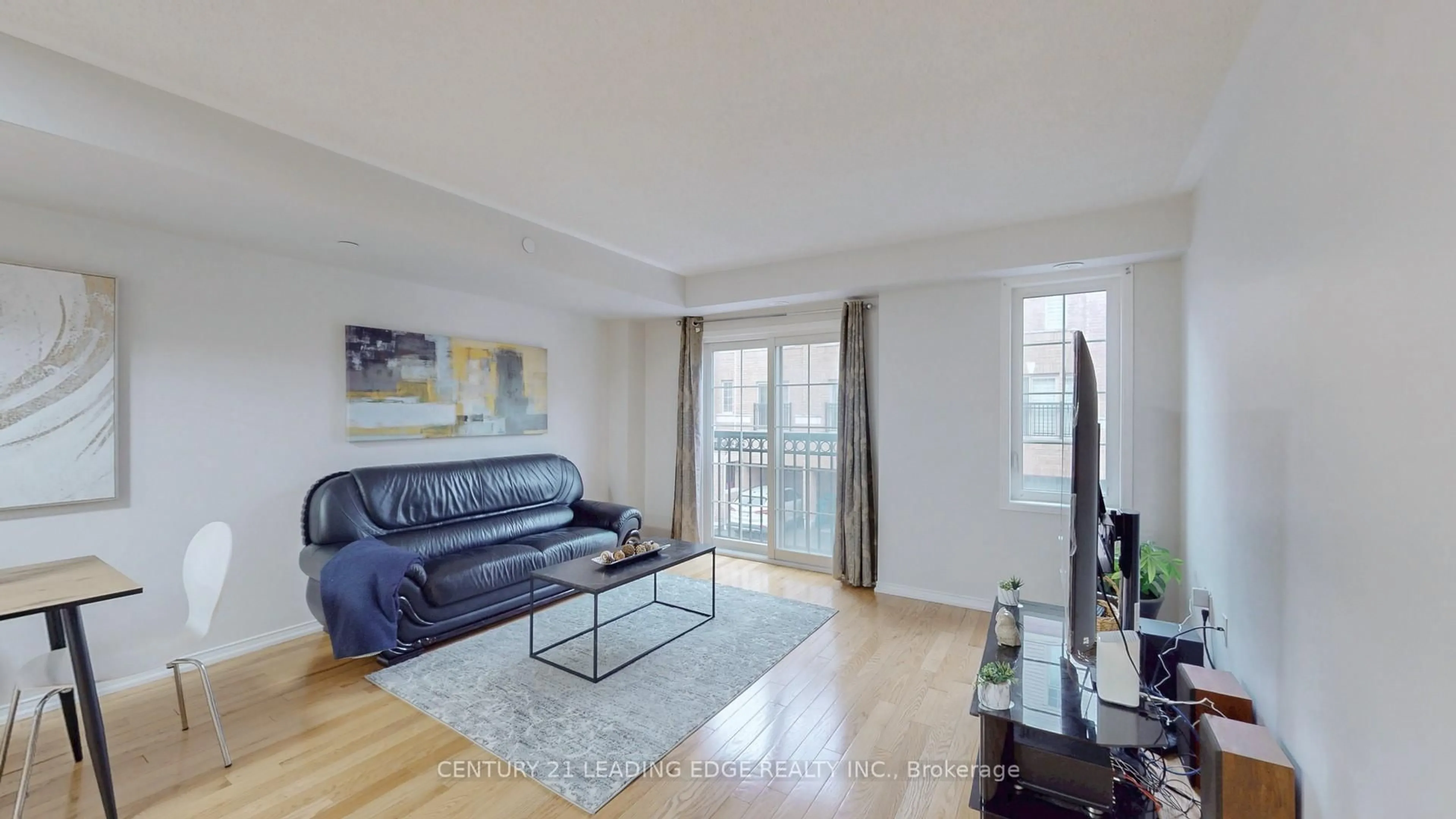 Living room with furniture, wood/laminate floor for 33 Foal Path #257, Oshawa Ontario L1L 0L2