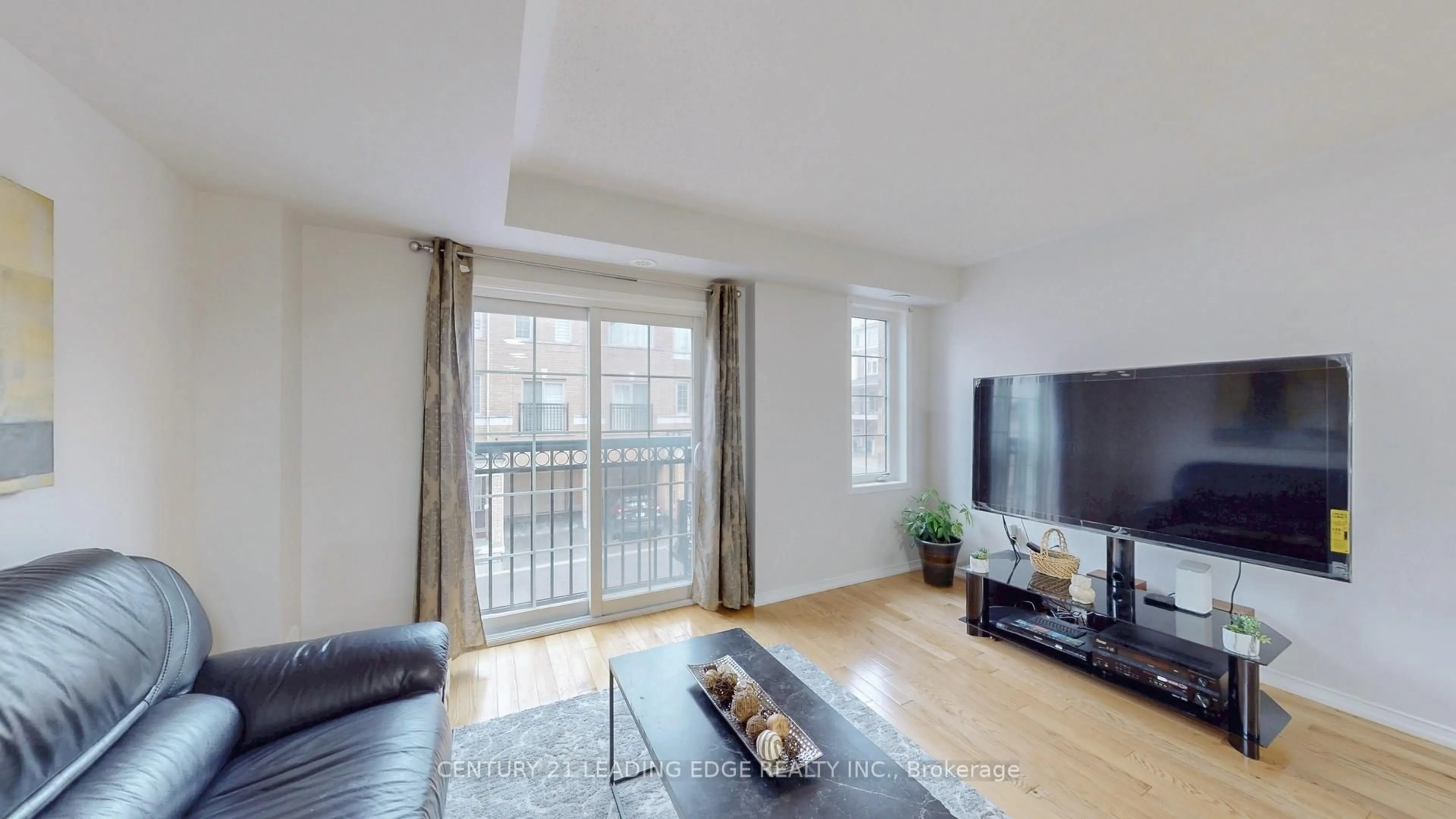 Living room with furniture, wood/laminate floor for 33 Foal Path #257, Oshawa Ontario L1L 0L2