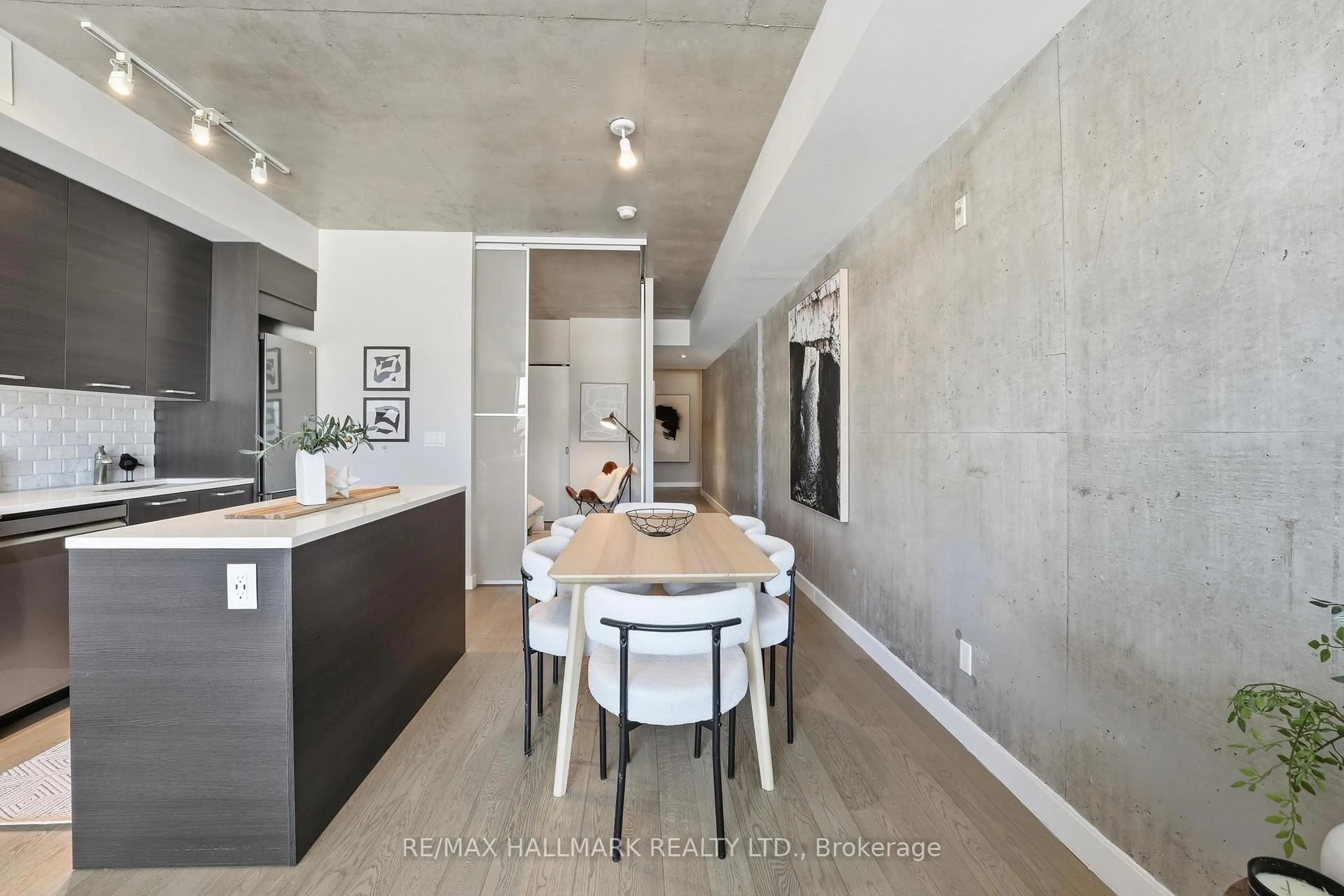 Open concept kitchen, cement floor for 90 Broadview Ave #305, Toronto Ontario M4M 0A7