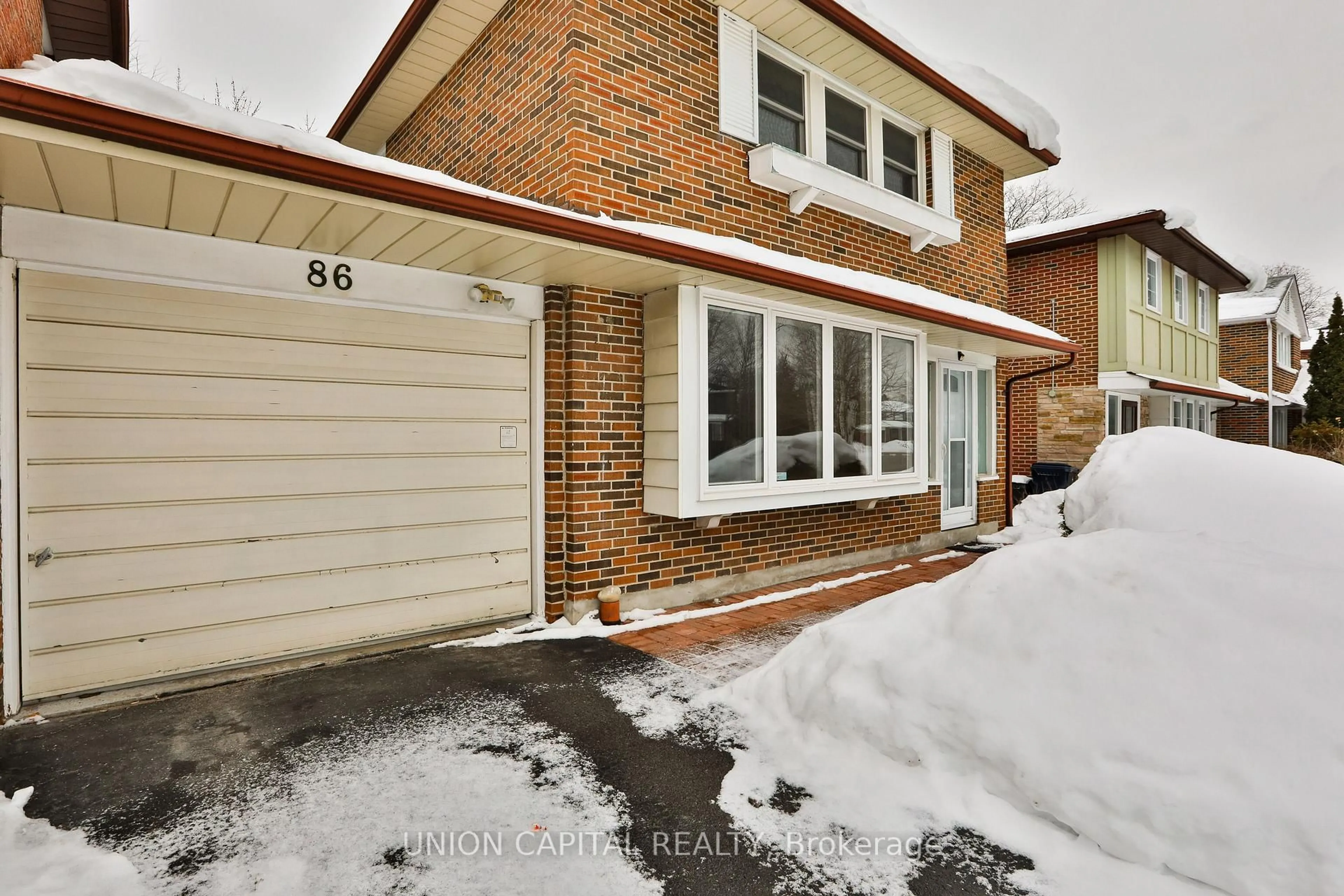 Home with brick exterior material, street for 86 Carondale Cres, Toronto Ontario M1W 2B1