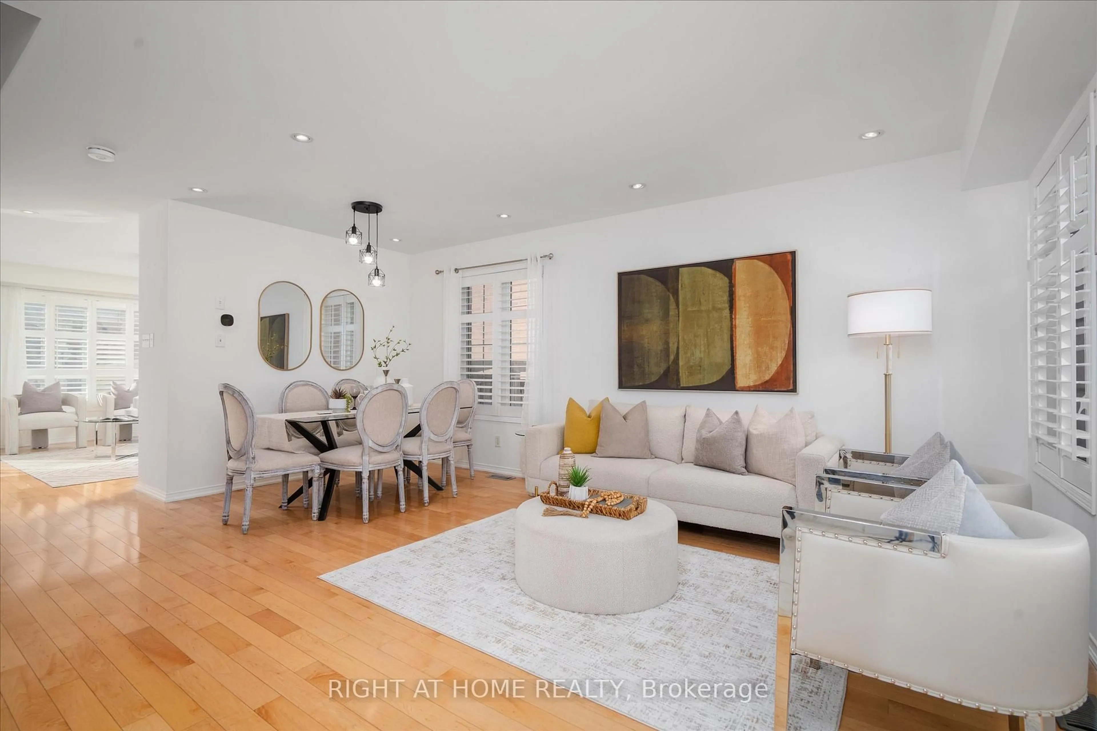 Living room with furniture, wood/laminate floor for 89 Haskell Ave, Ajax Ontario L1T 0C7