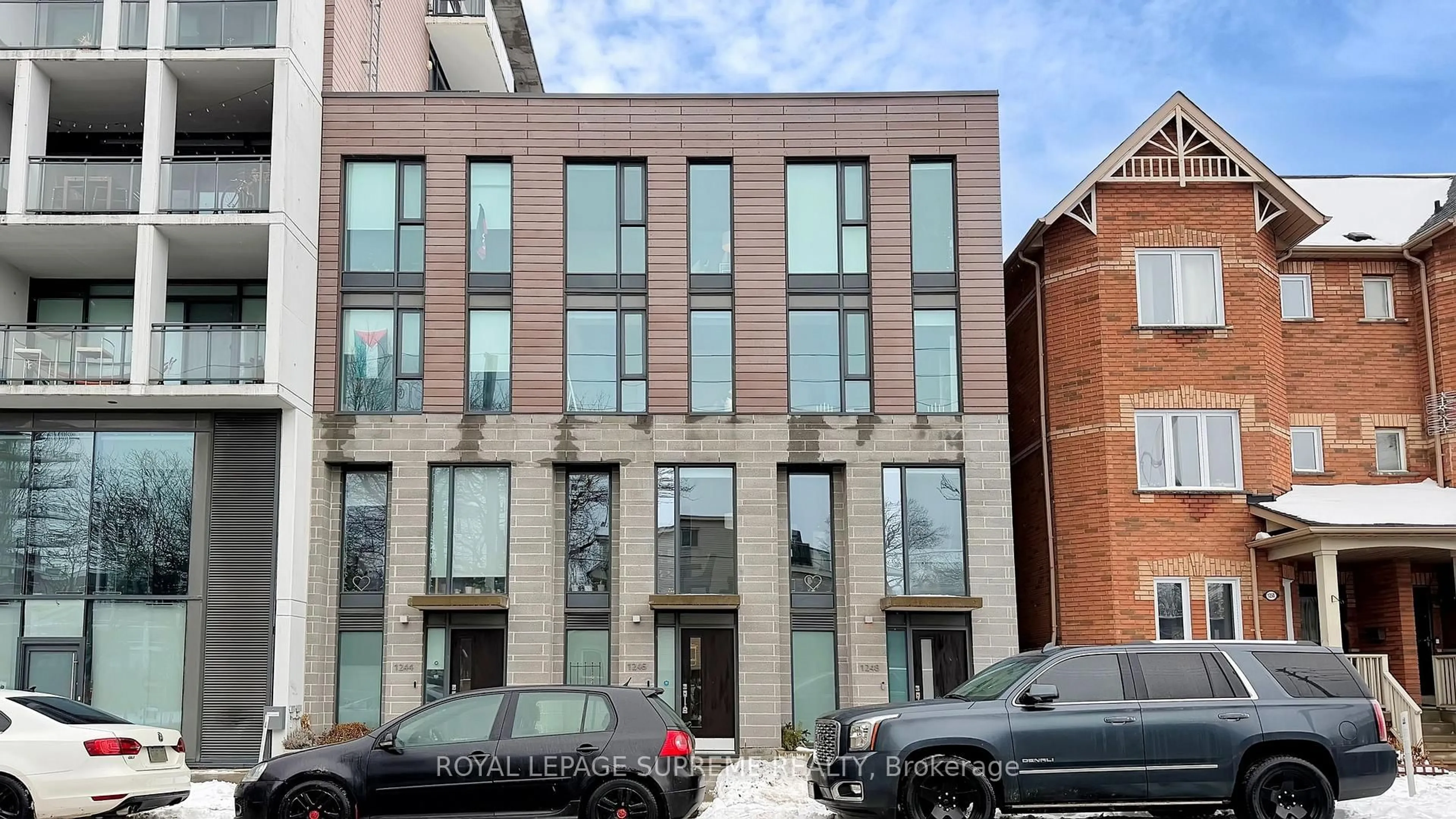 Home with brick exterior material, building for 1246 Dundas St, Toronto Ontario M4M 1S3