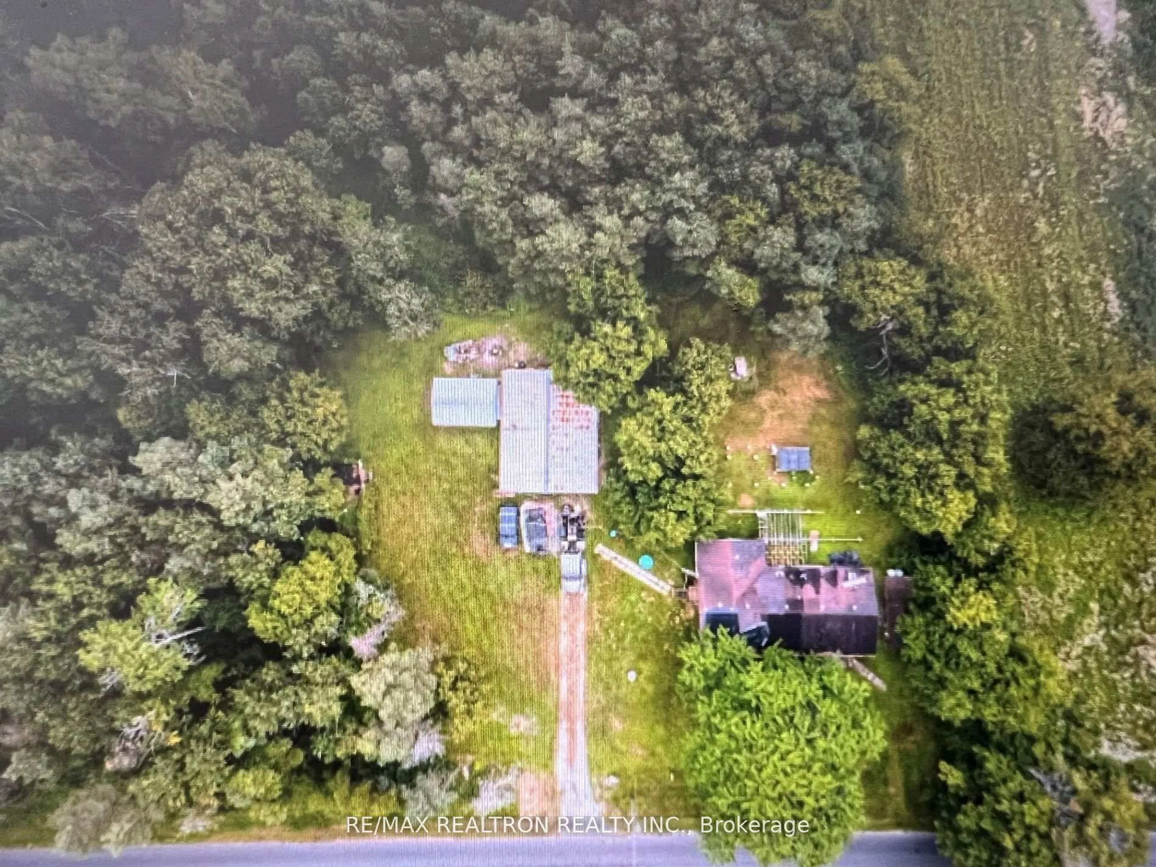 A pic from outside/outdoor area/front of a property/back of a property/a pic from drone, forest/trees view for 3293 Holt Rd, Clarington Ontario L1C 6H3