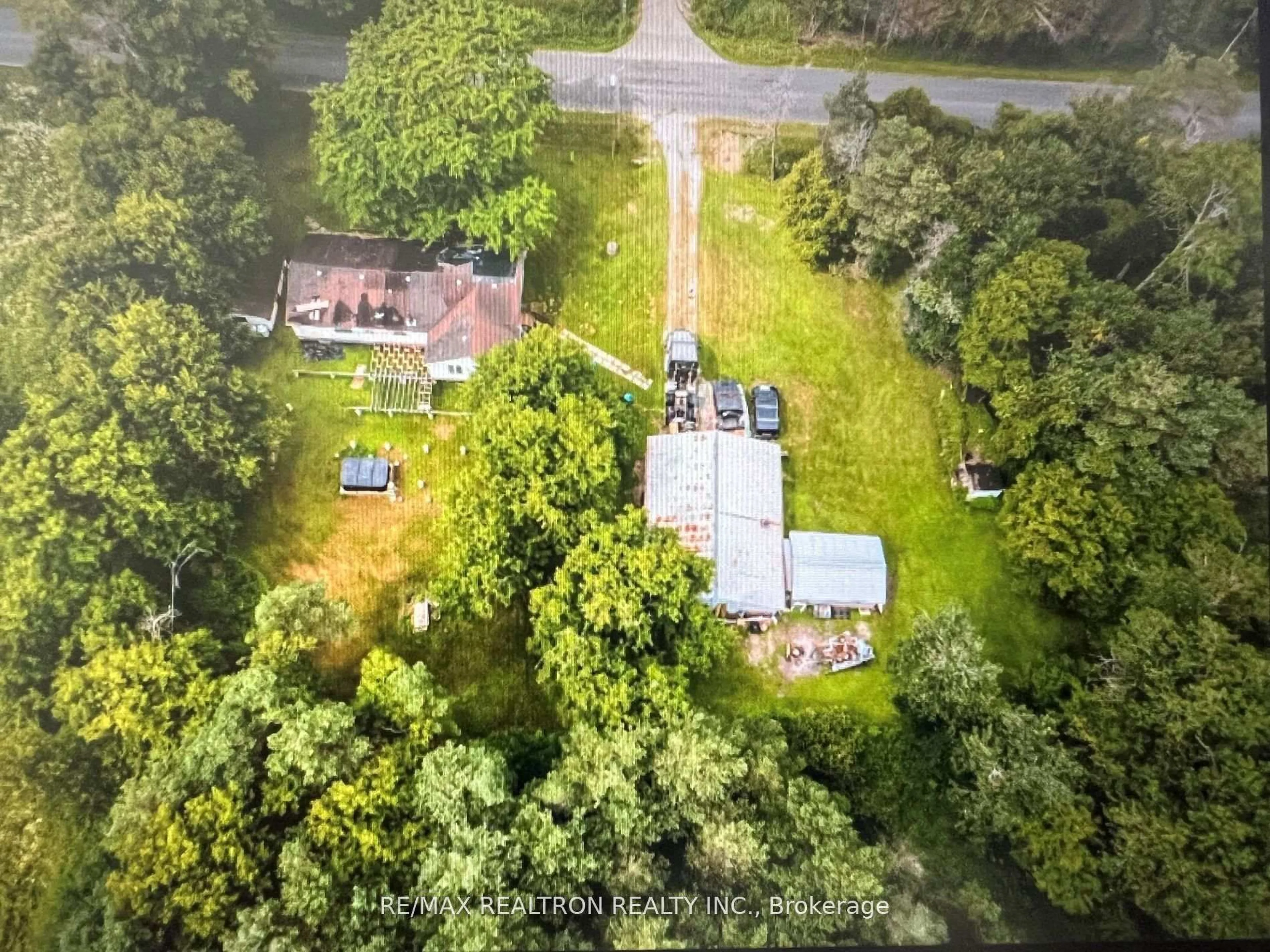 A pic from outside/outdoor area/front of a property/back of a property/a pic from drone, forest/trees view for 3293 Holt Rd, Clarington Ontario L1C 6H3