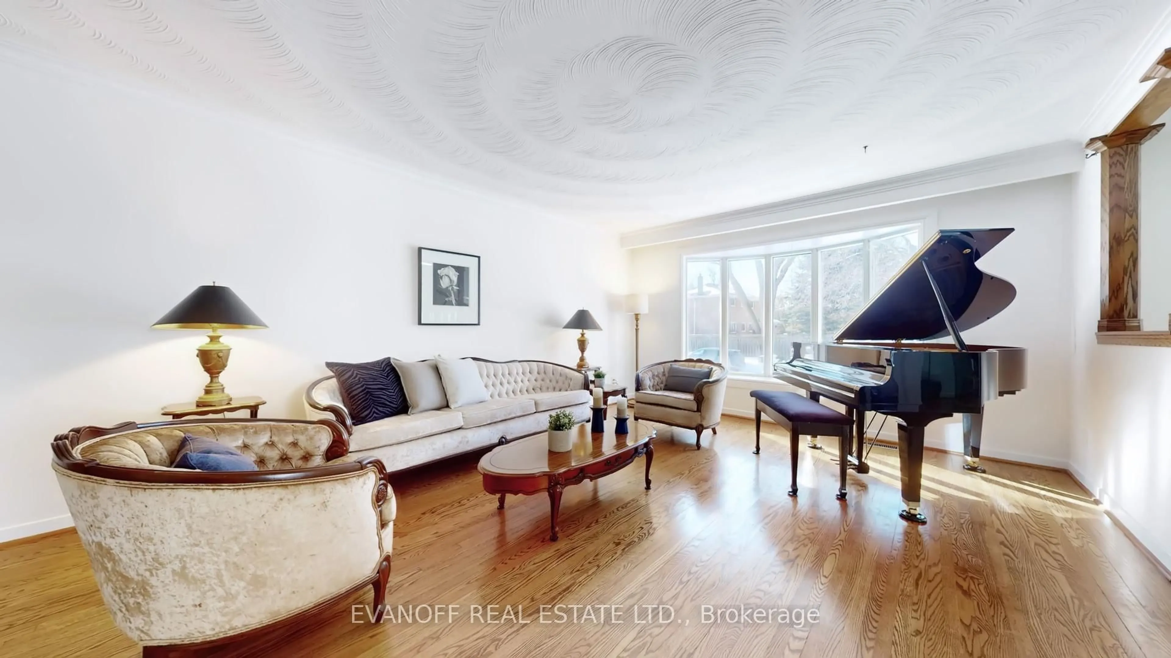 Living room with furniture, wood/laminate floor for 63 South Marine Dr, Toronto Ontario M1E 1A1