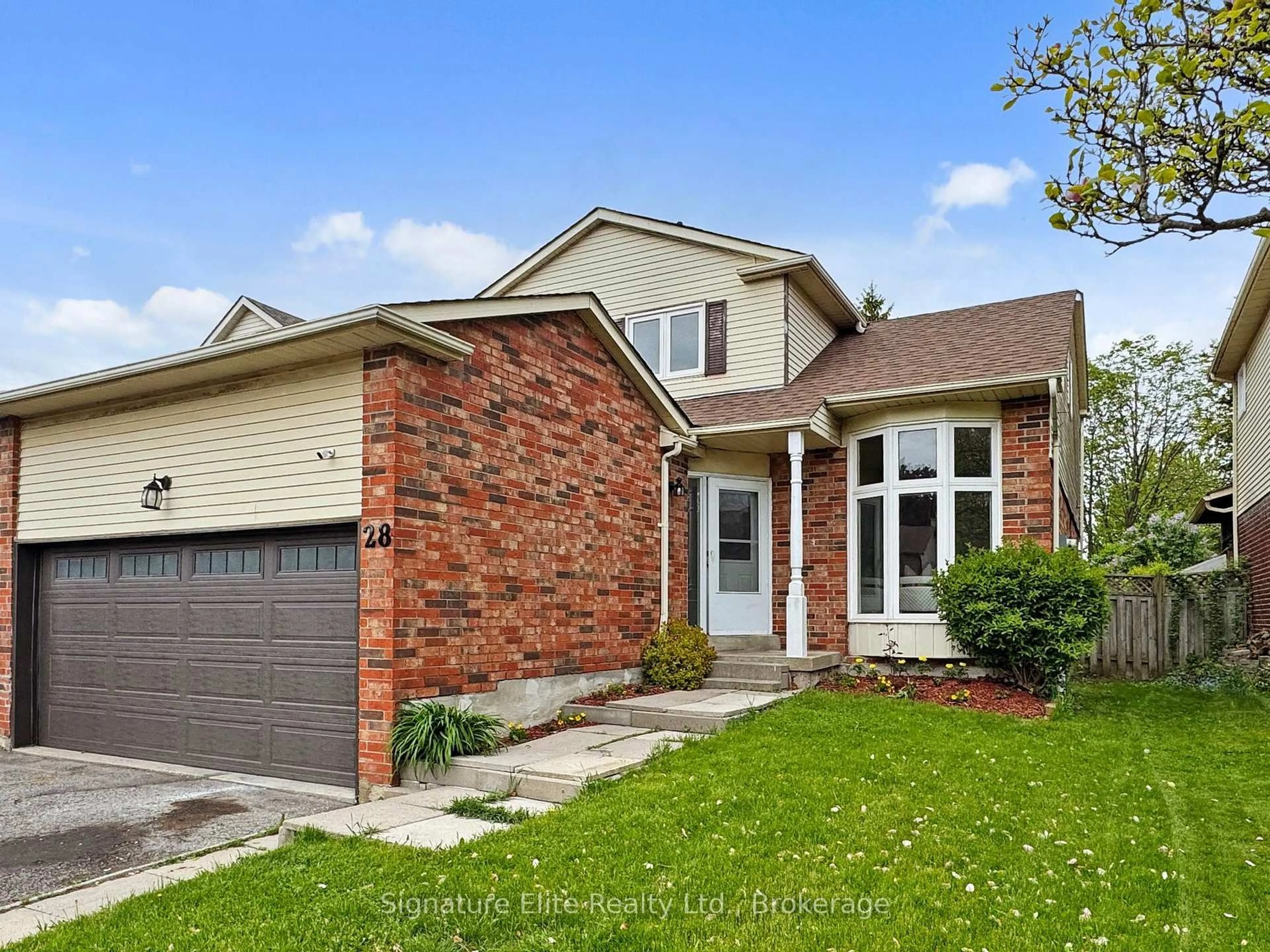 Home with brick exterior material, street for 28 Reed Dr, Ajax Ontario L1S 5S1