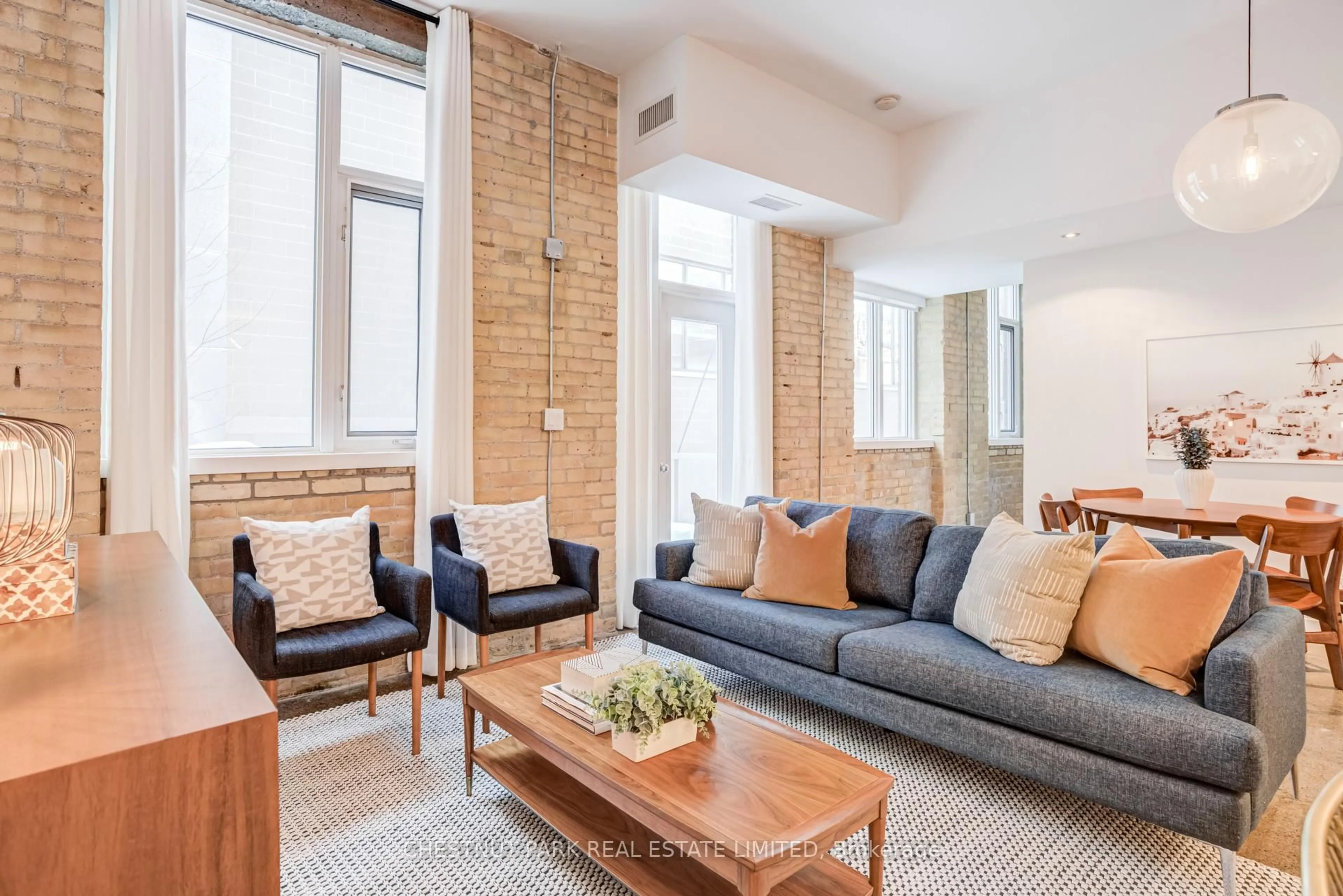 Living room with furniture, unknown for 201 Carlaw Ave #225, Toronto Ontario M4M 2S3