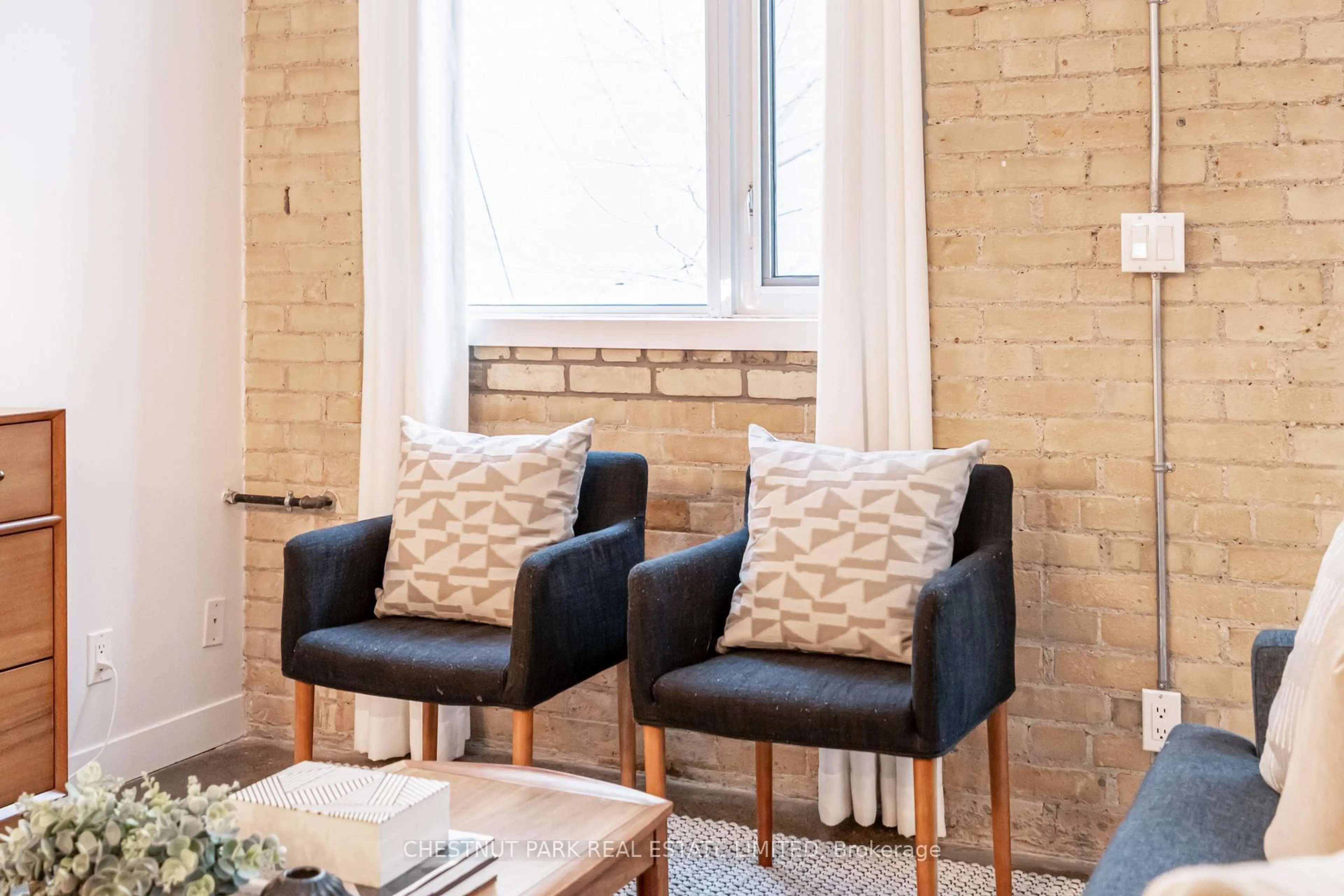 Living room with furniture, unknown for 201 Carlaw Ave #225, Toronto Ontario M4M 2S3