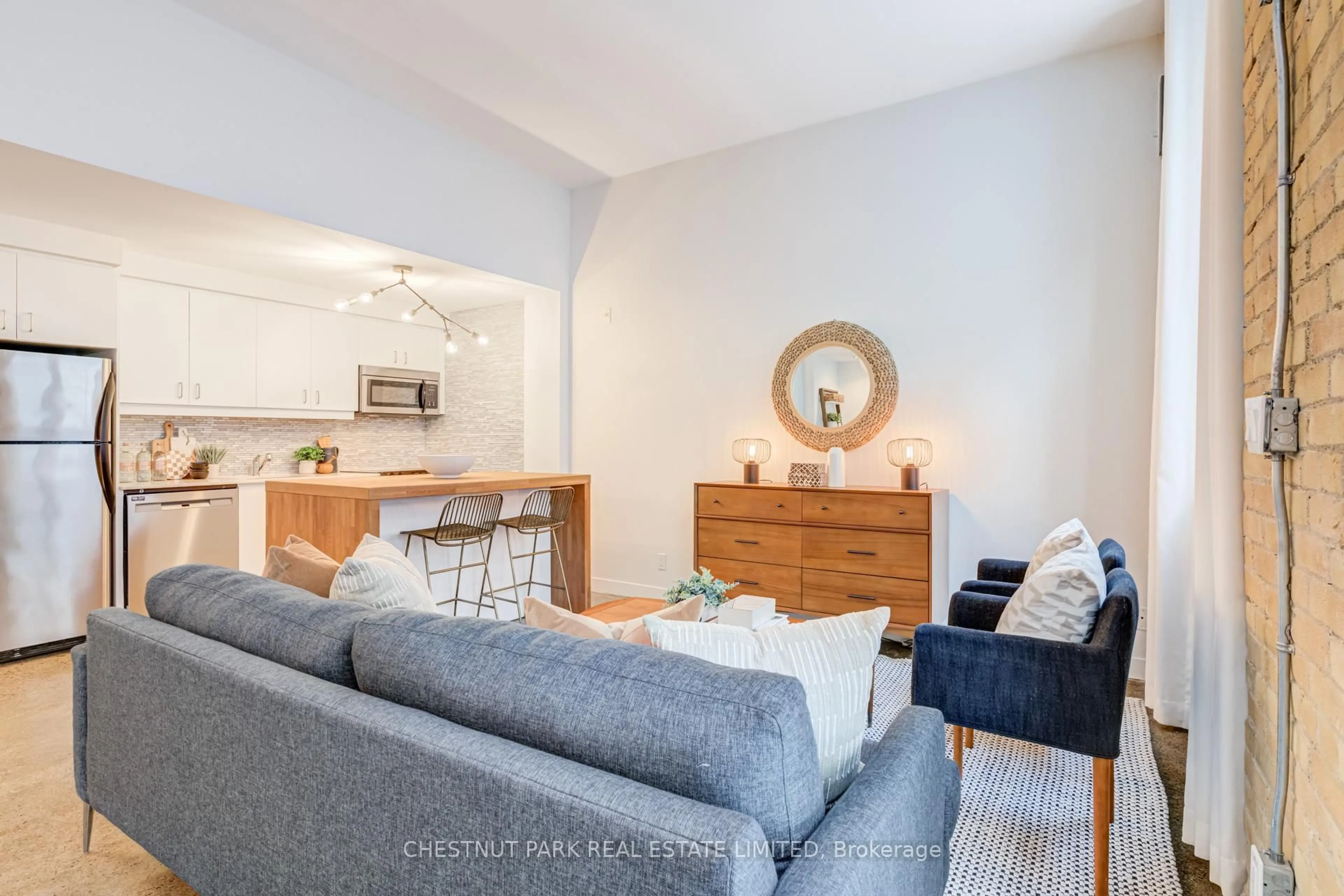 Living room with furniture, unknown for 201 Carlaw Ave #225, Toronto Ontario M4M 2S3