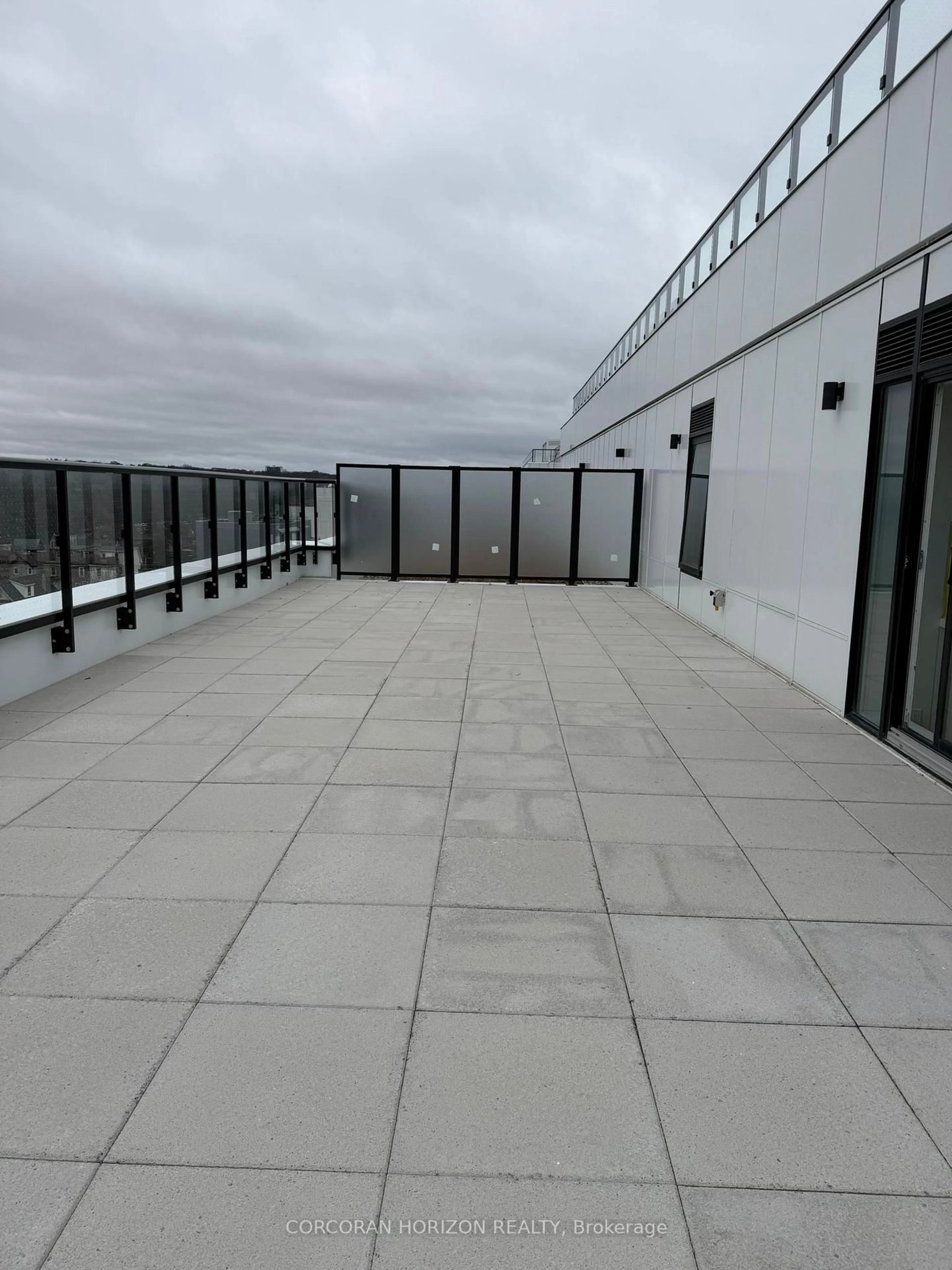 Patio, city buildings view from balcony for 1050 Eastern Ave #819, Toronto Ontario M4L 0B7