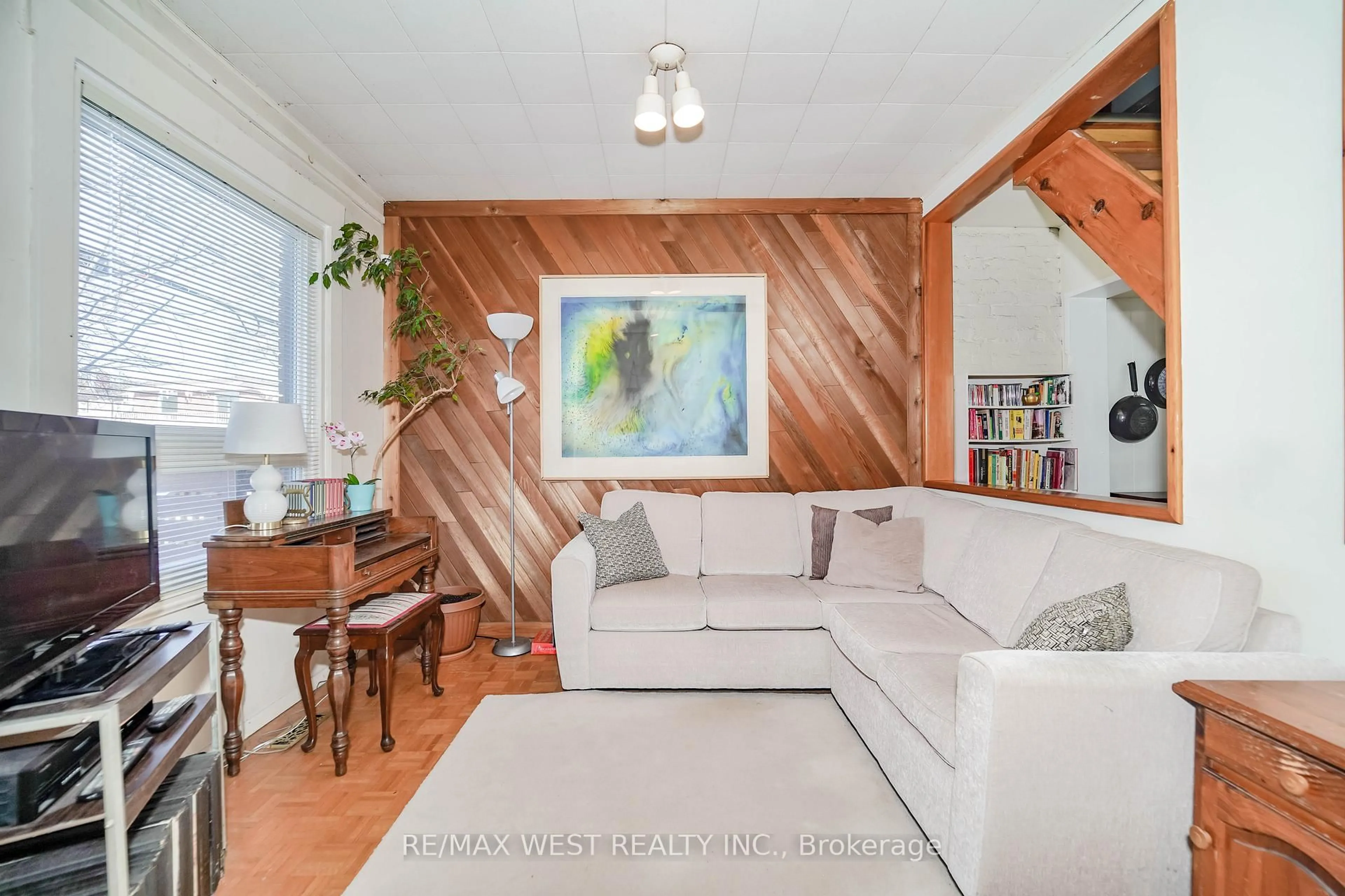 Living room with furniture, wood/laminate floor for 193 Barker Ave, Toronto Ontario M4C 2P4