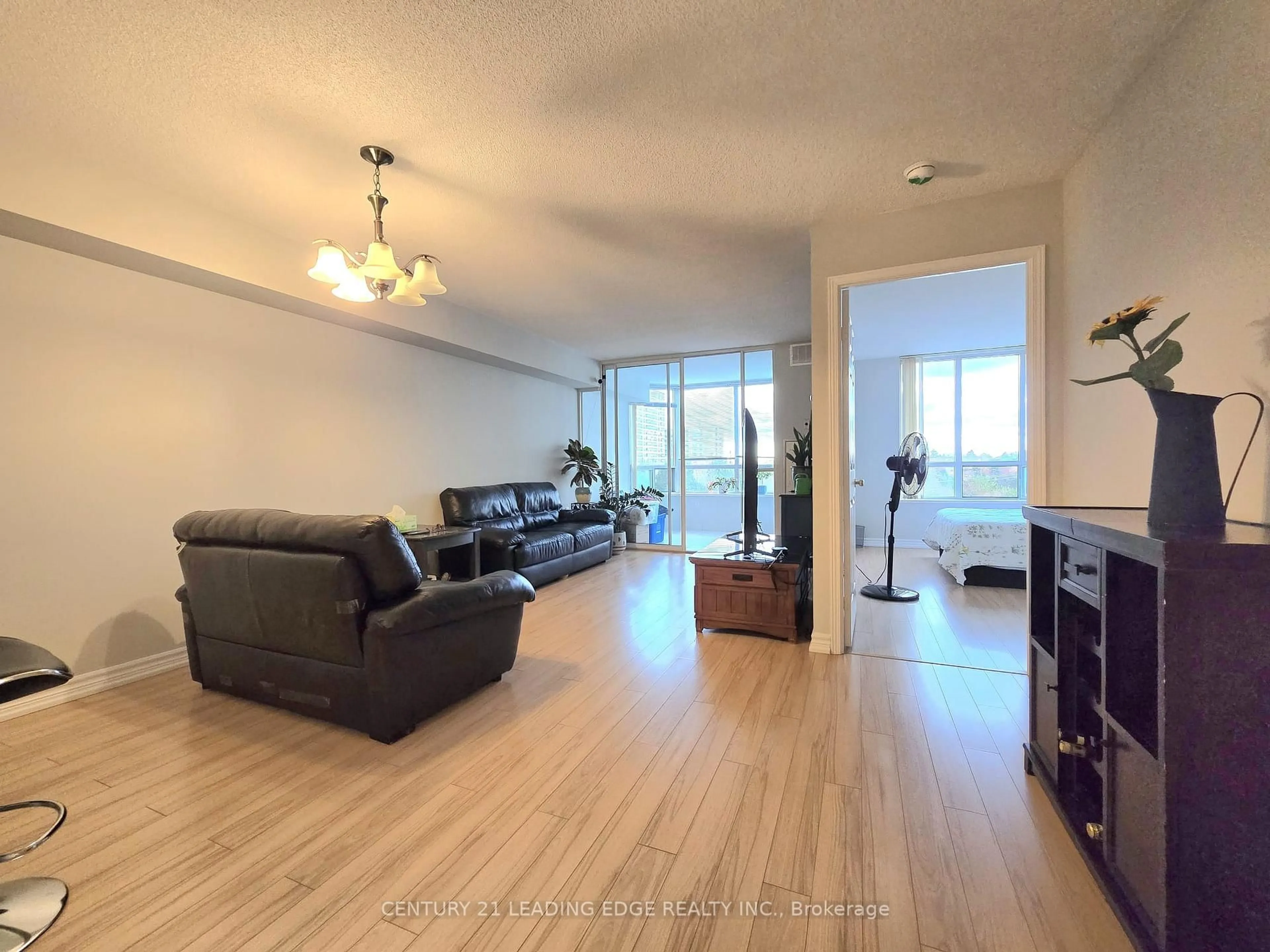 Living room with furniture, unknown for 5001 Finch Ave #610, Toronto Ontario M1S 5J9
