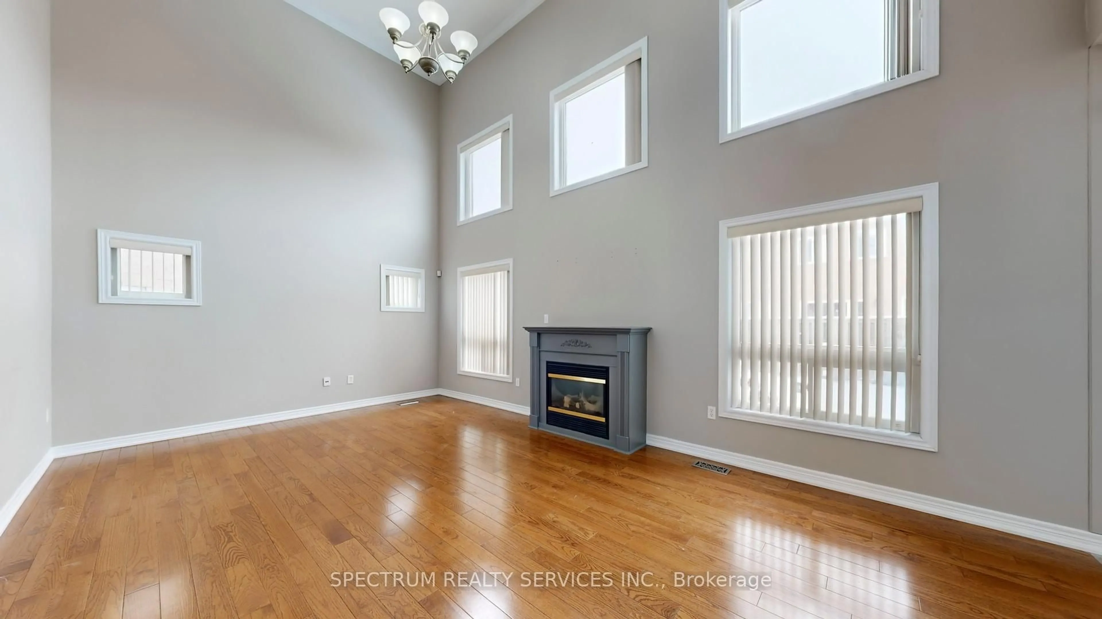 Living room with furniture, wood/laminate floor for 8 Westacott Ave, Ajax Ontario L1T 4H6