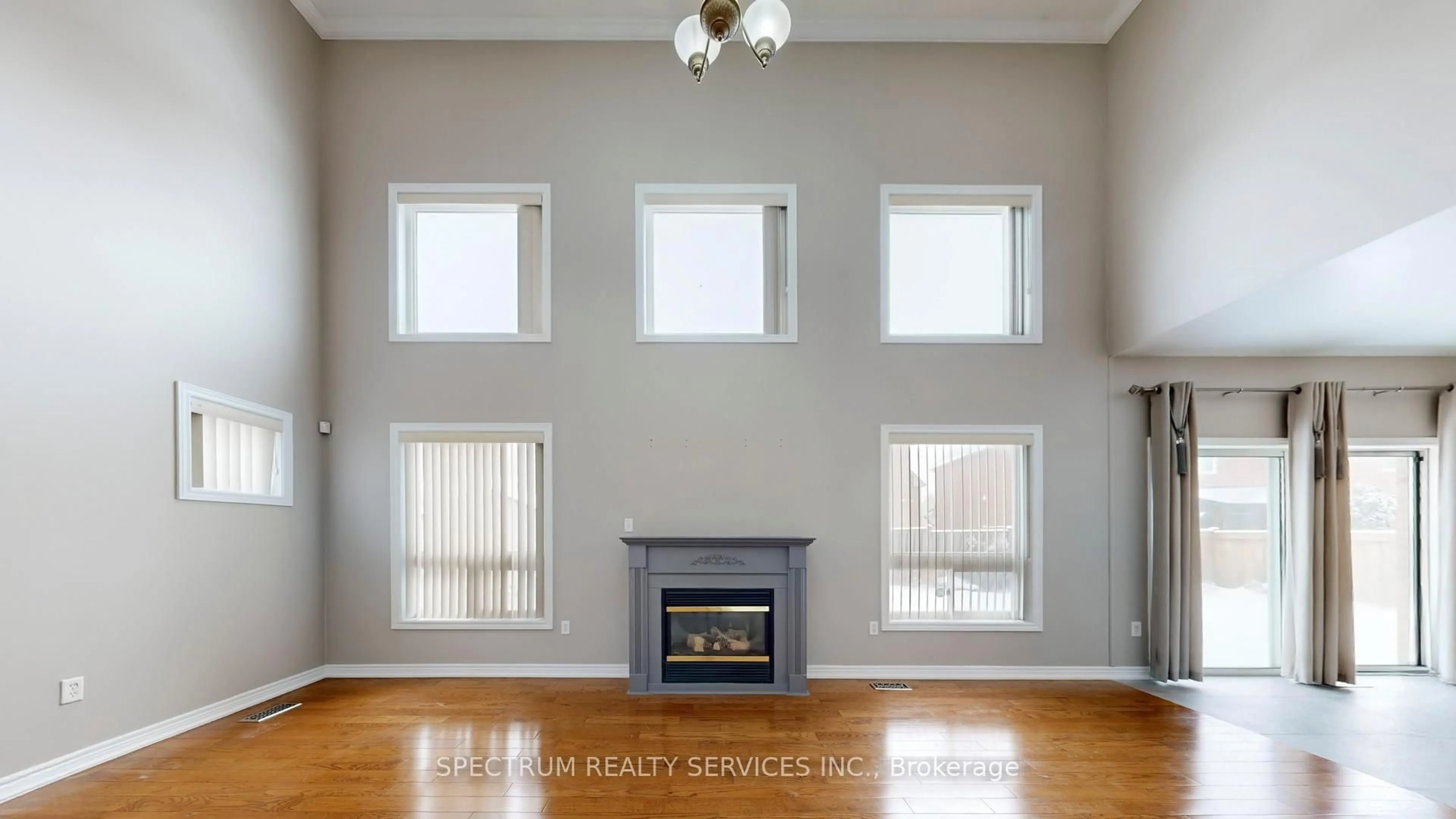 Living room with furniture, wood/laminate floor for 8 Westacott Ave, Ajax Ontario L1T 4H6