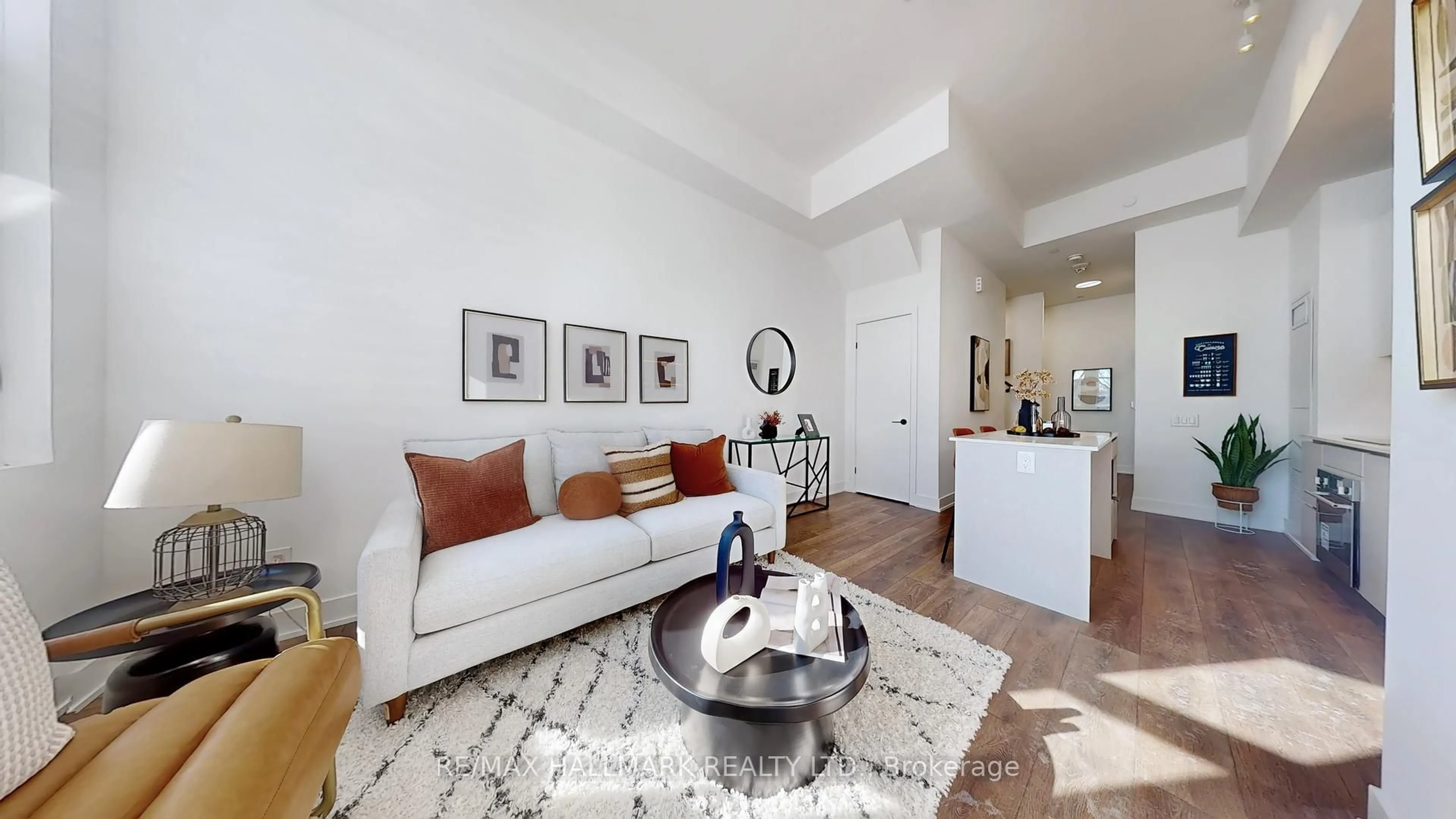 Living room with furniture, unknown for 1285 Queen St #102, Toronto Ontario M4L 1C2