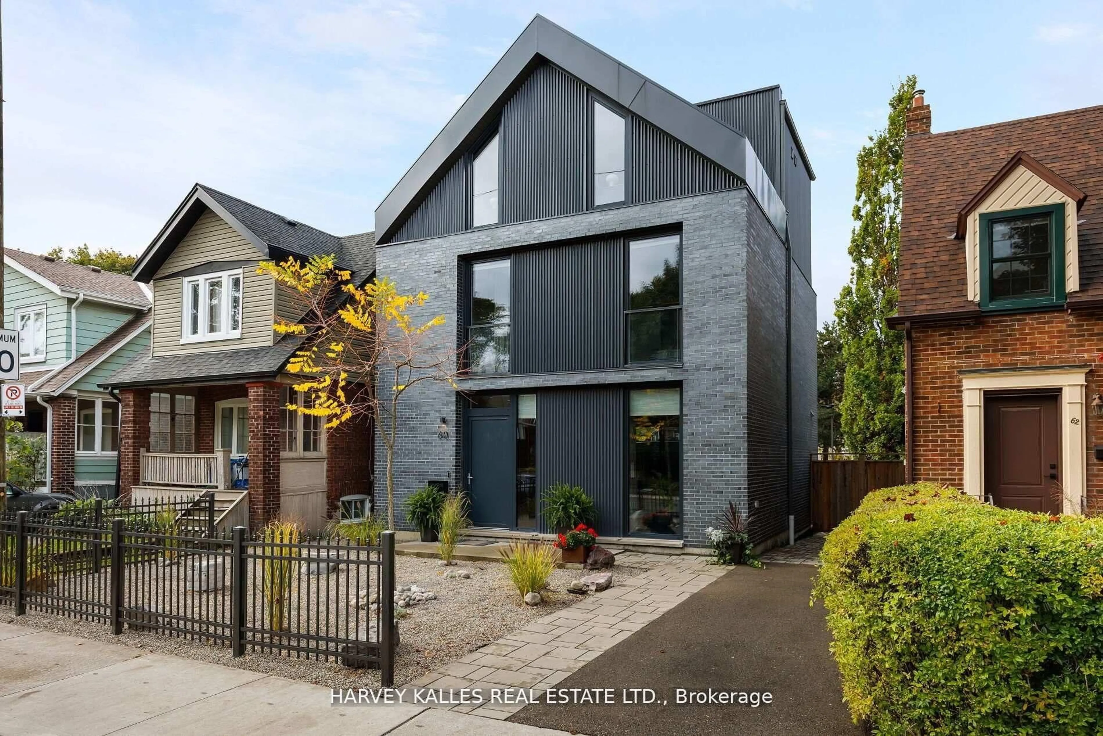 Home with brick exterior material, street for 60 Hiltz Ave, Toronto Ontario M4L 2N5