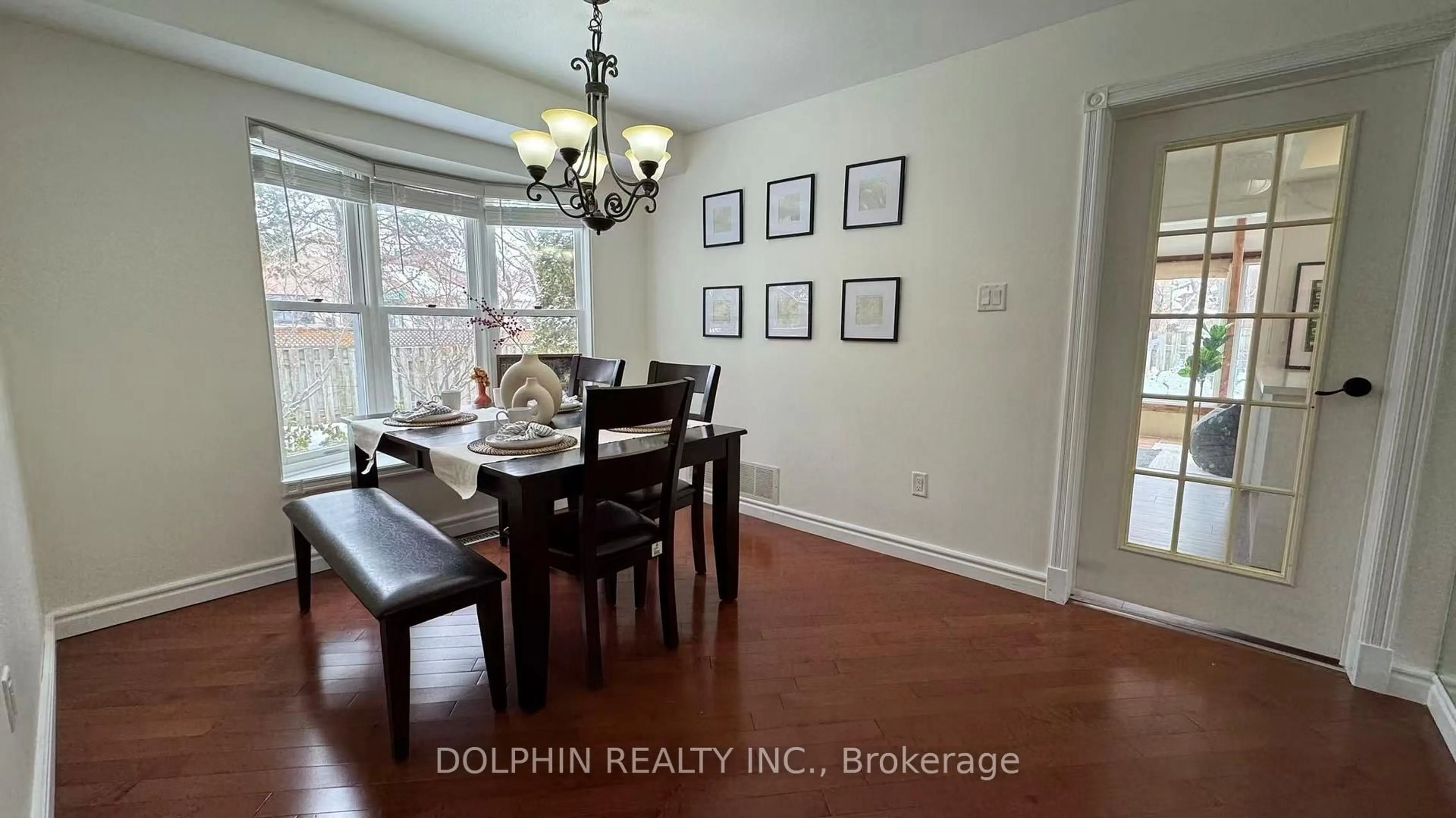 Dining room, wood/laminate floor for 44 Ravenscroft Rd, Ajax Ontario L1T 1W2