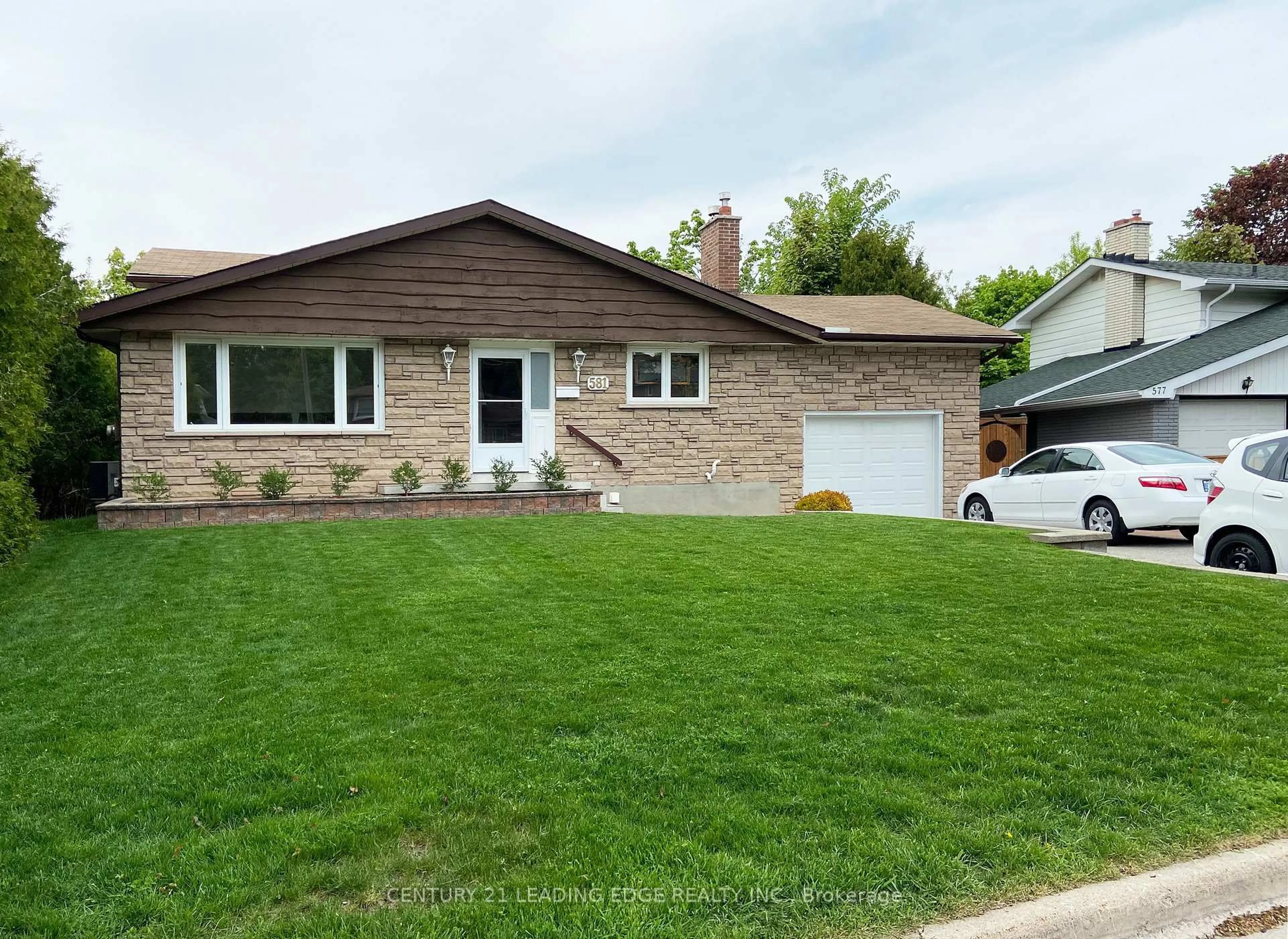 Home with vinyl exterior material, street for 581 Arnhem Dr, Oshawa Ontario L1G 2J7