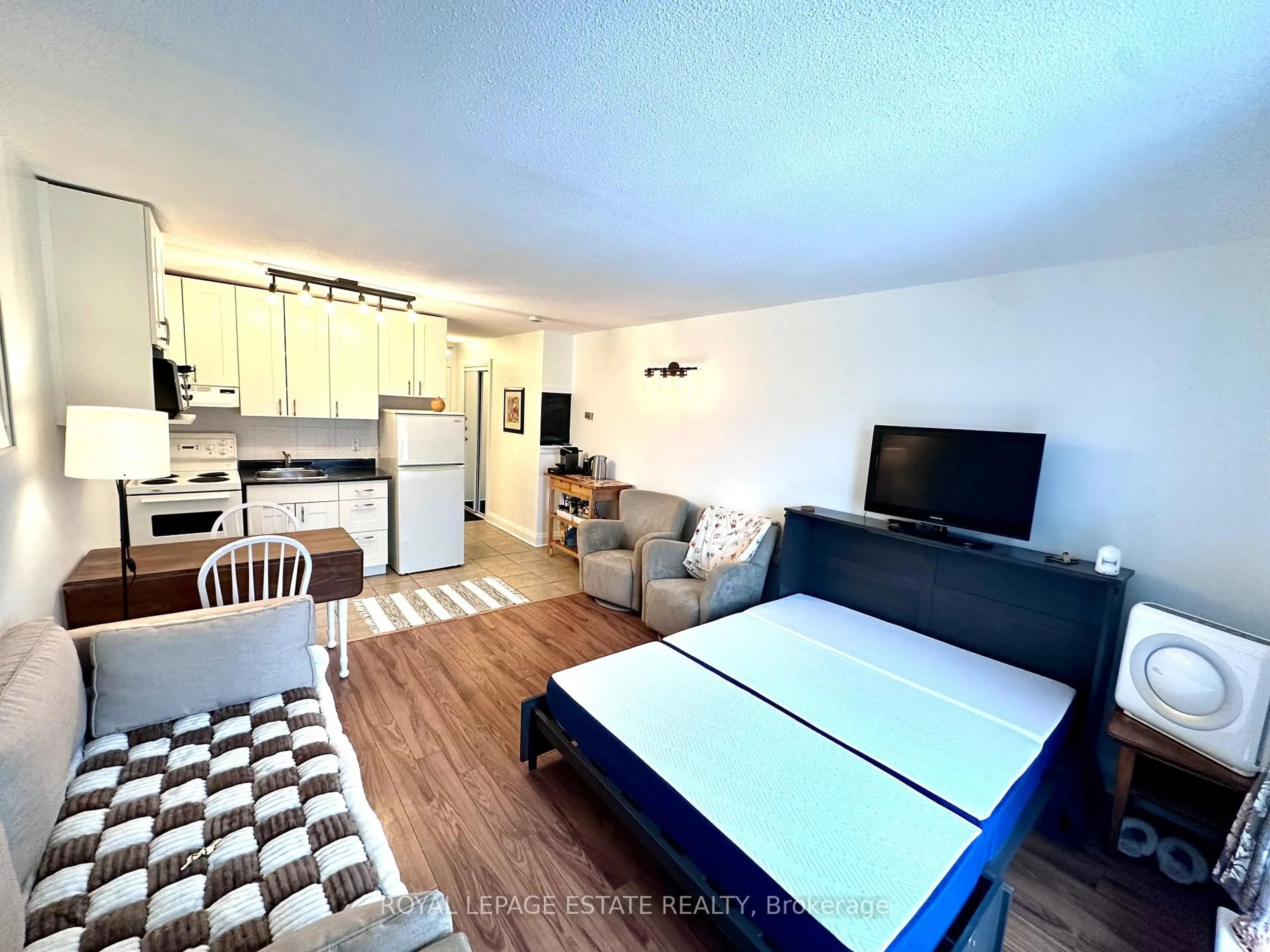 Living room with furniture, unknown for 123 Woodbine Ave #309, Toronto Ontario M4L 3V8