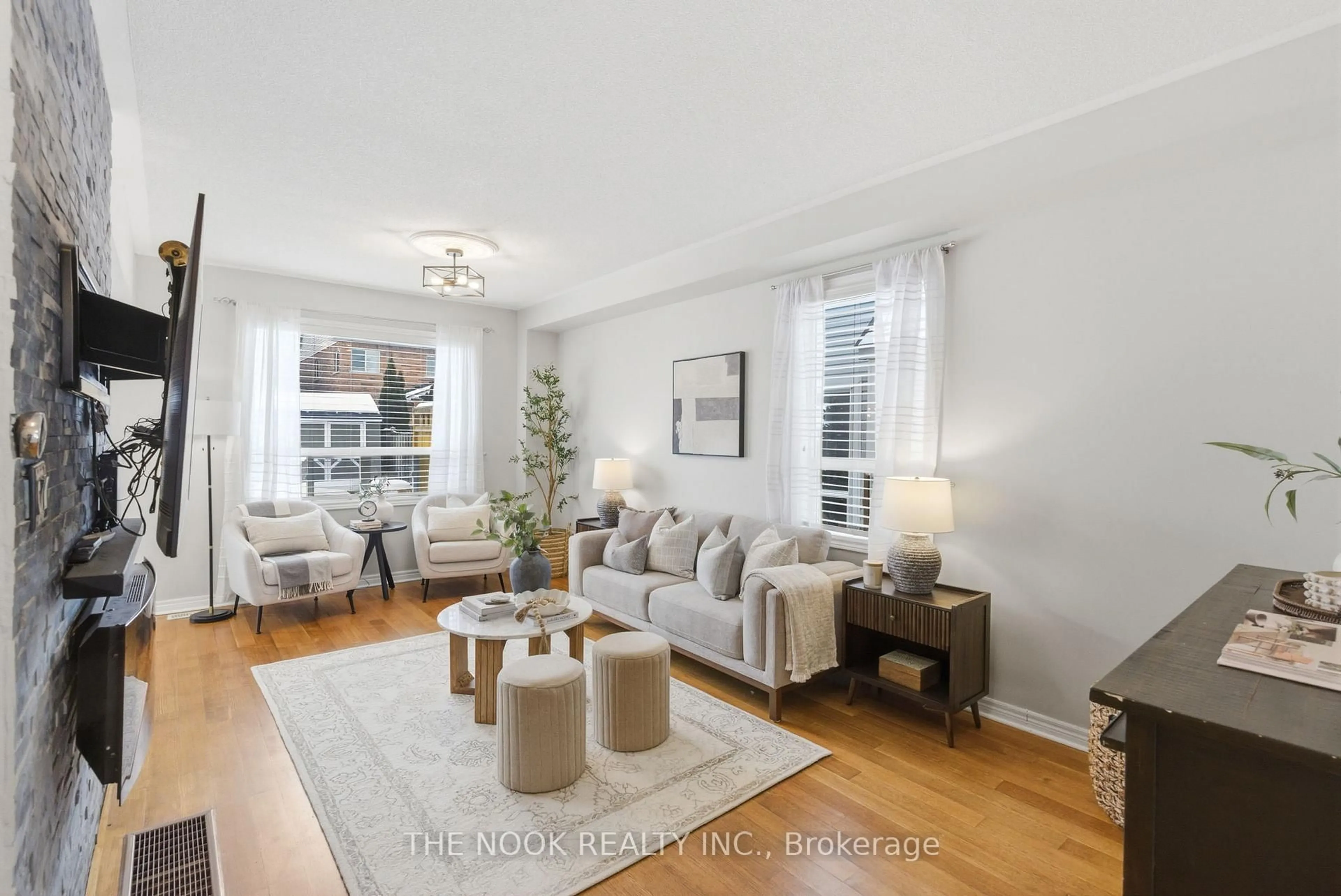 Living room with furniture, wood/laminate floor for 8 Northgrove Cres, Whitby Ontario L1M 2M8