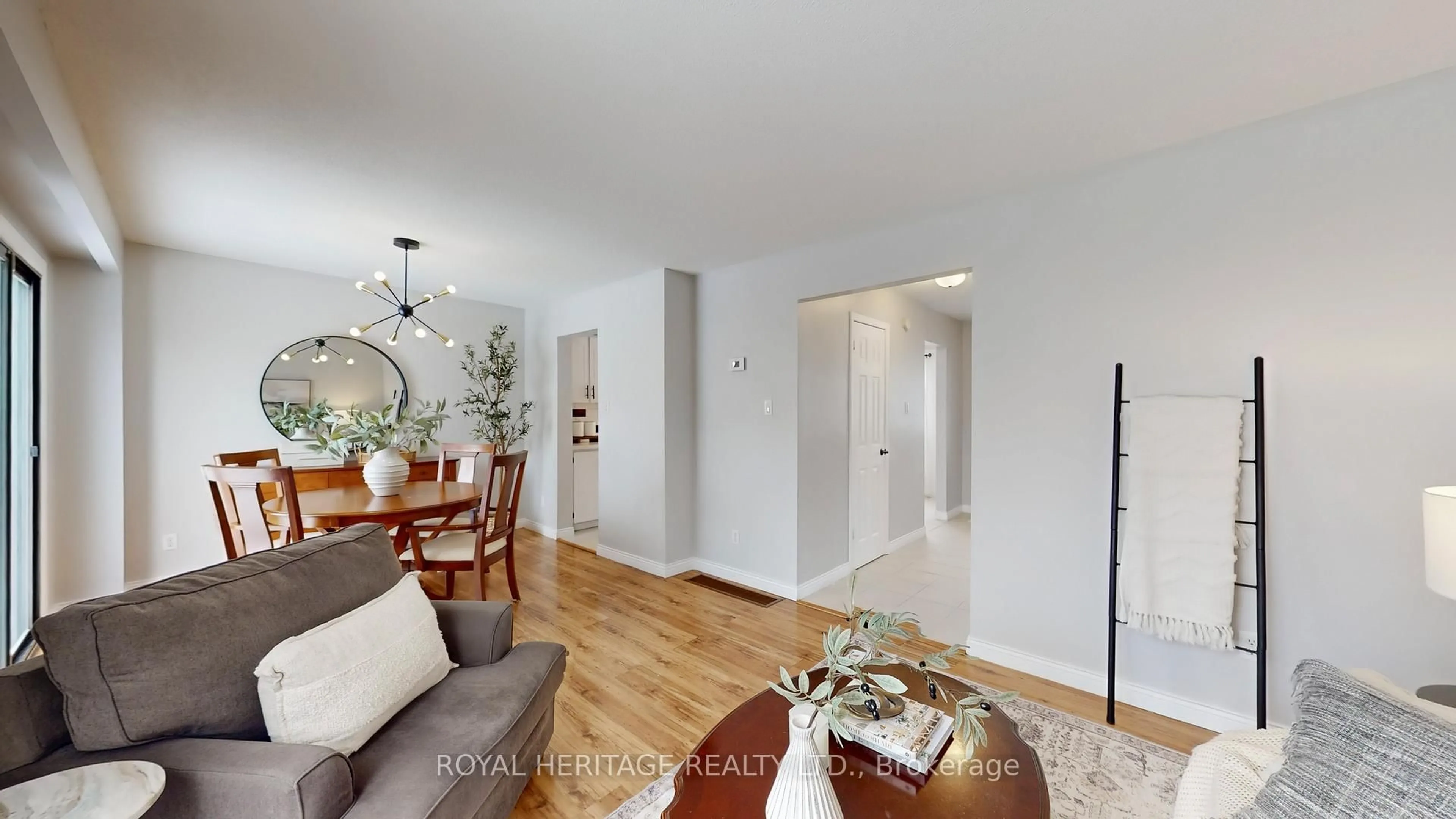 Living room with furniture, wood/laminate floor for 8 Burden Cres, Ajax Ontario L1T 3T8