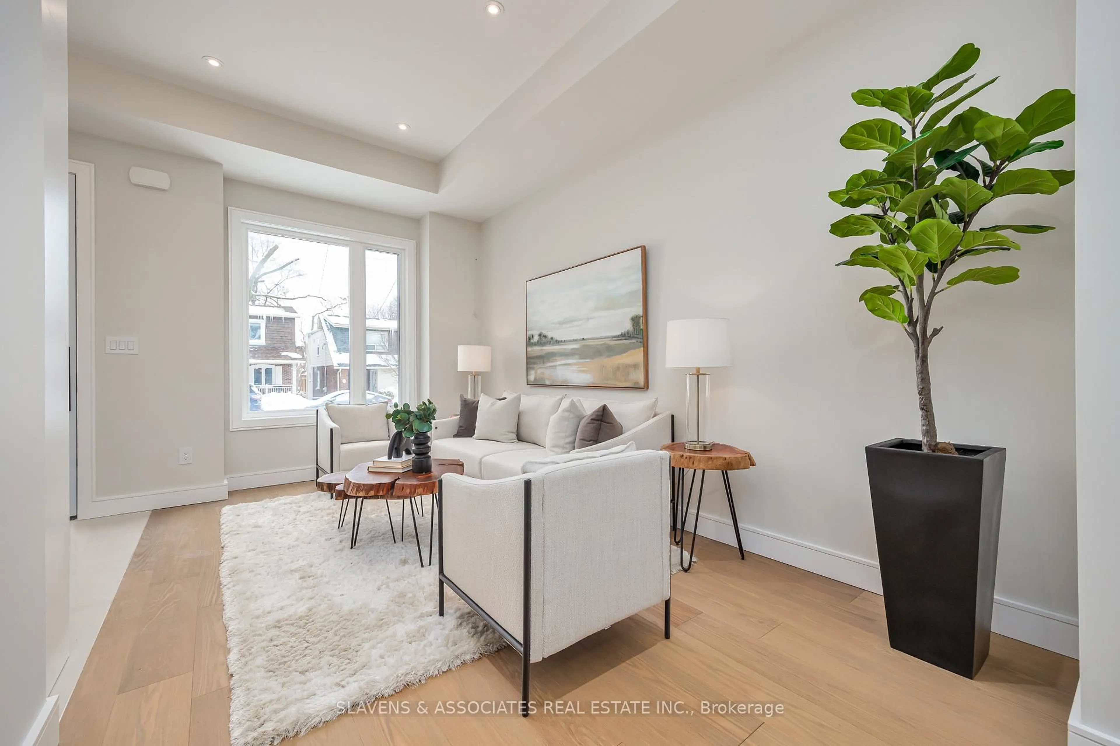 Living room with furniture, wood/laminate floor for 3B Linton Ave, Toronto Ontario M1N 1W5