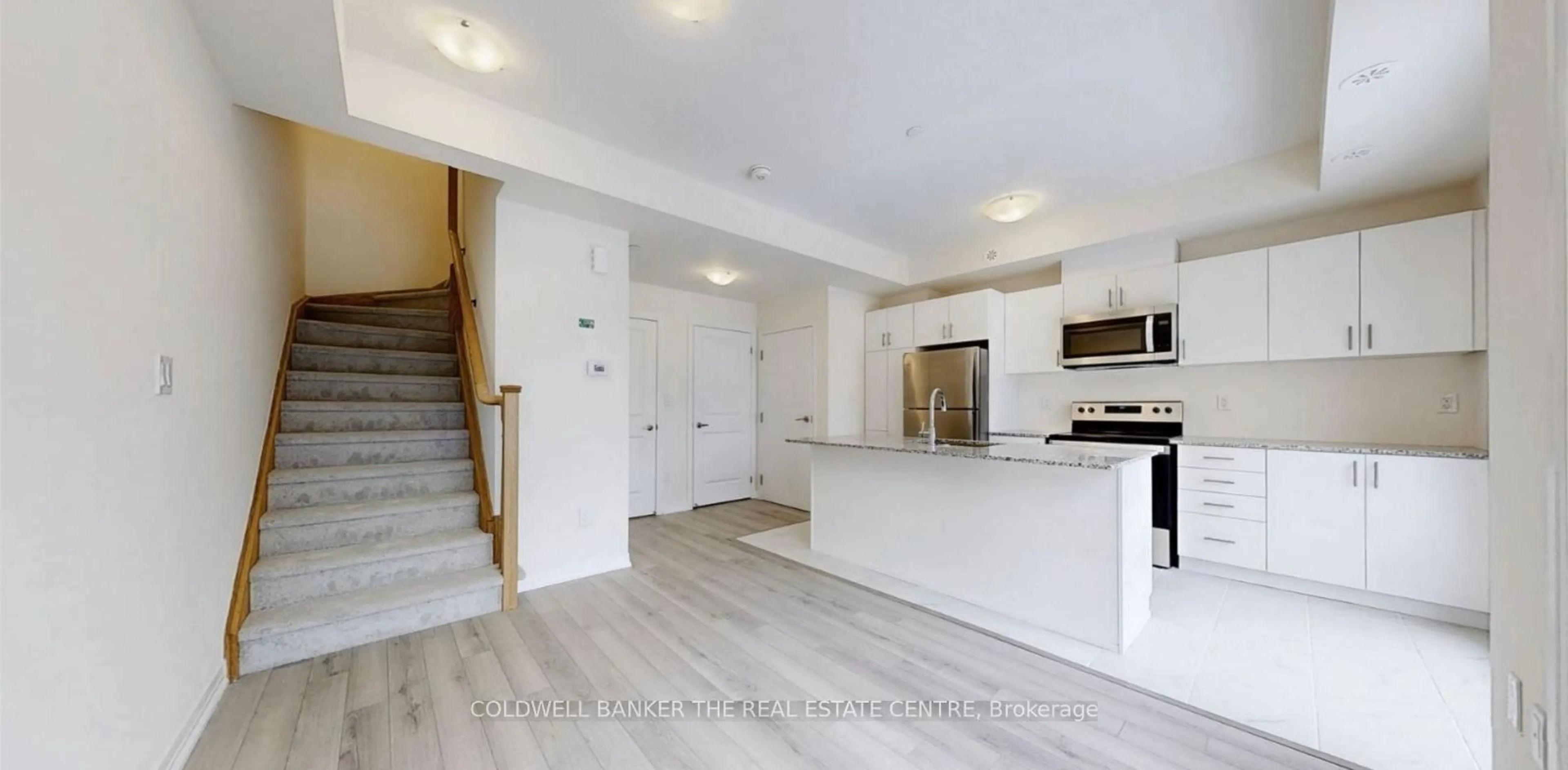 Open concept kitchen, unknown for 165 Tapscott Rd #32, Toronto Ontario M1B 0E8