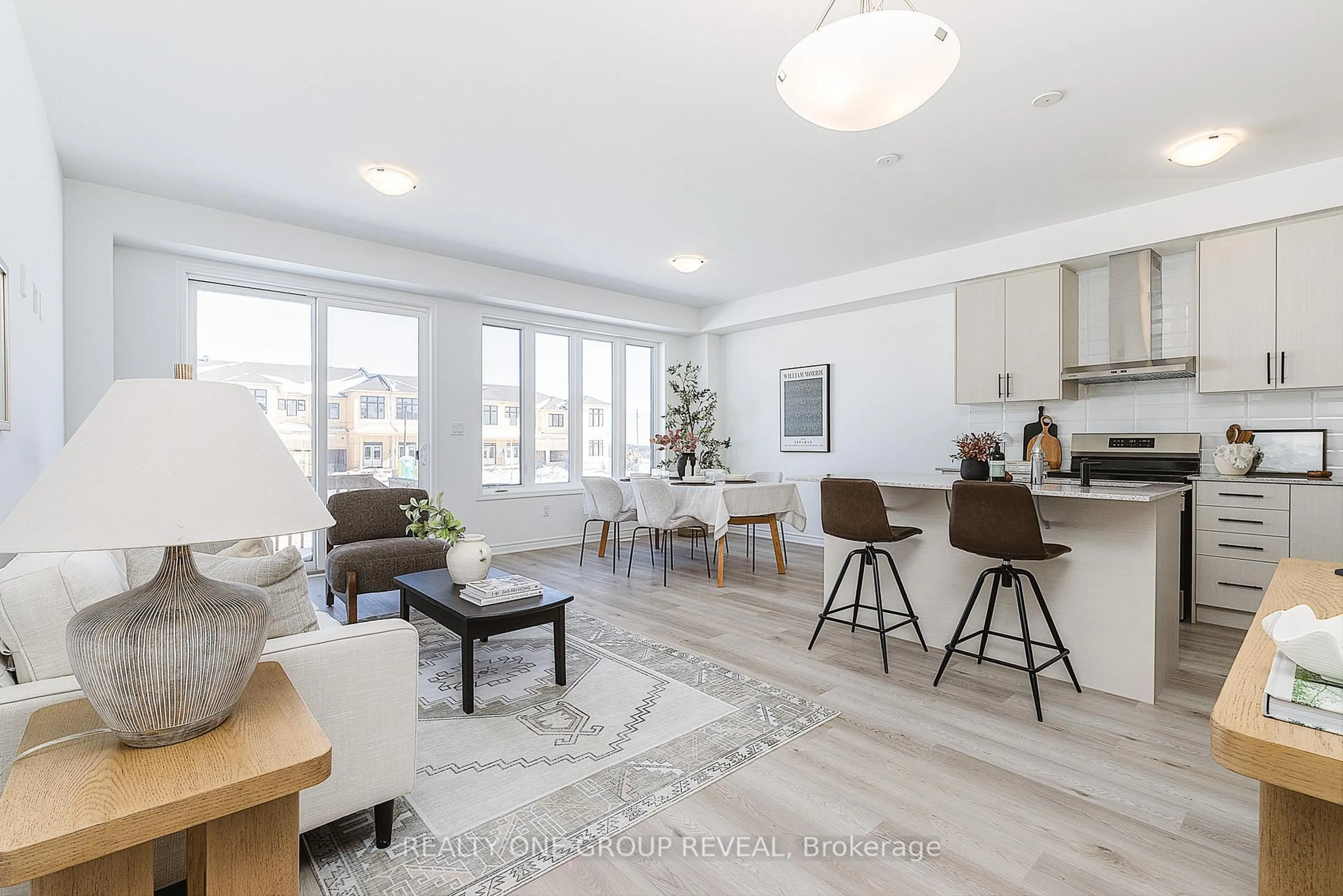 Living room with furniture, wood/laminate floor for 3515 BRICKYARD Dr, Pickering Ontario L1X 0J2