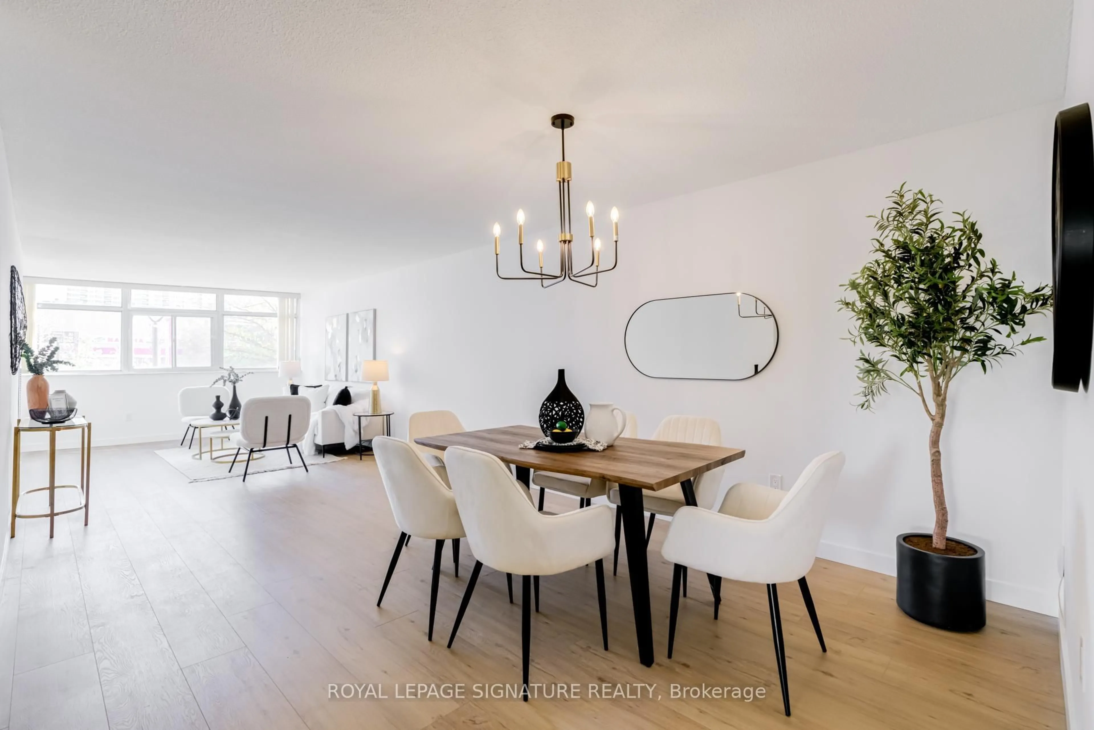 Dining room, wood/laminate floor for 3151 Bridletowne Circ #203, Toronto Ontario M1W 2T1