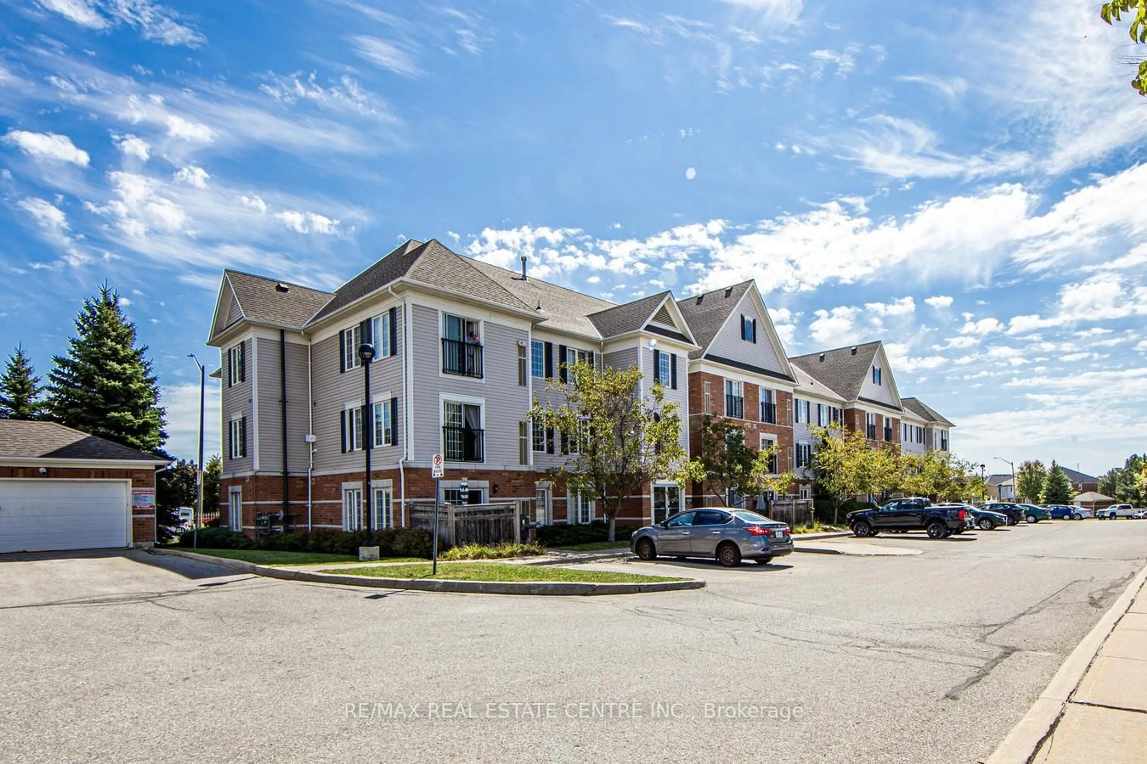 A pic from outside/outdoor area/front of a property/back of a property/a pic from drone, unknown for 106 Aspen Springs Dr #207, Clarington Ontario L1C 5N7