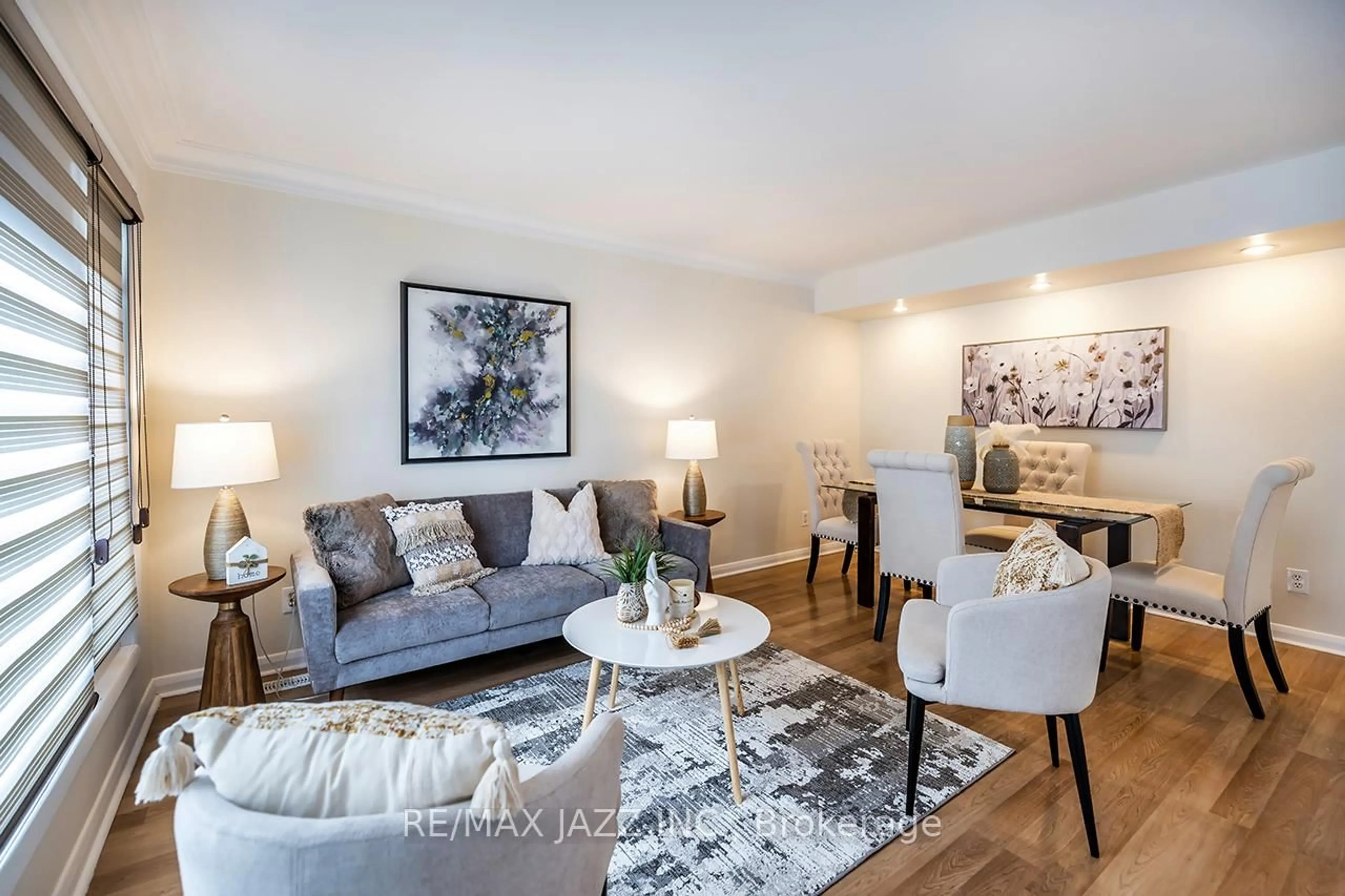 Living room with furniture, wood/laminate floor for 444 Elizabeth St, Oshawa Ontario L1J 5T1