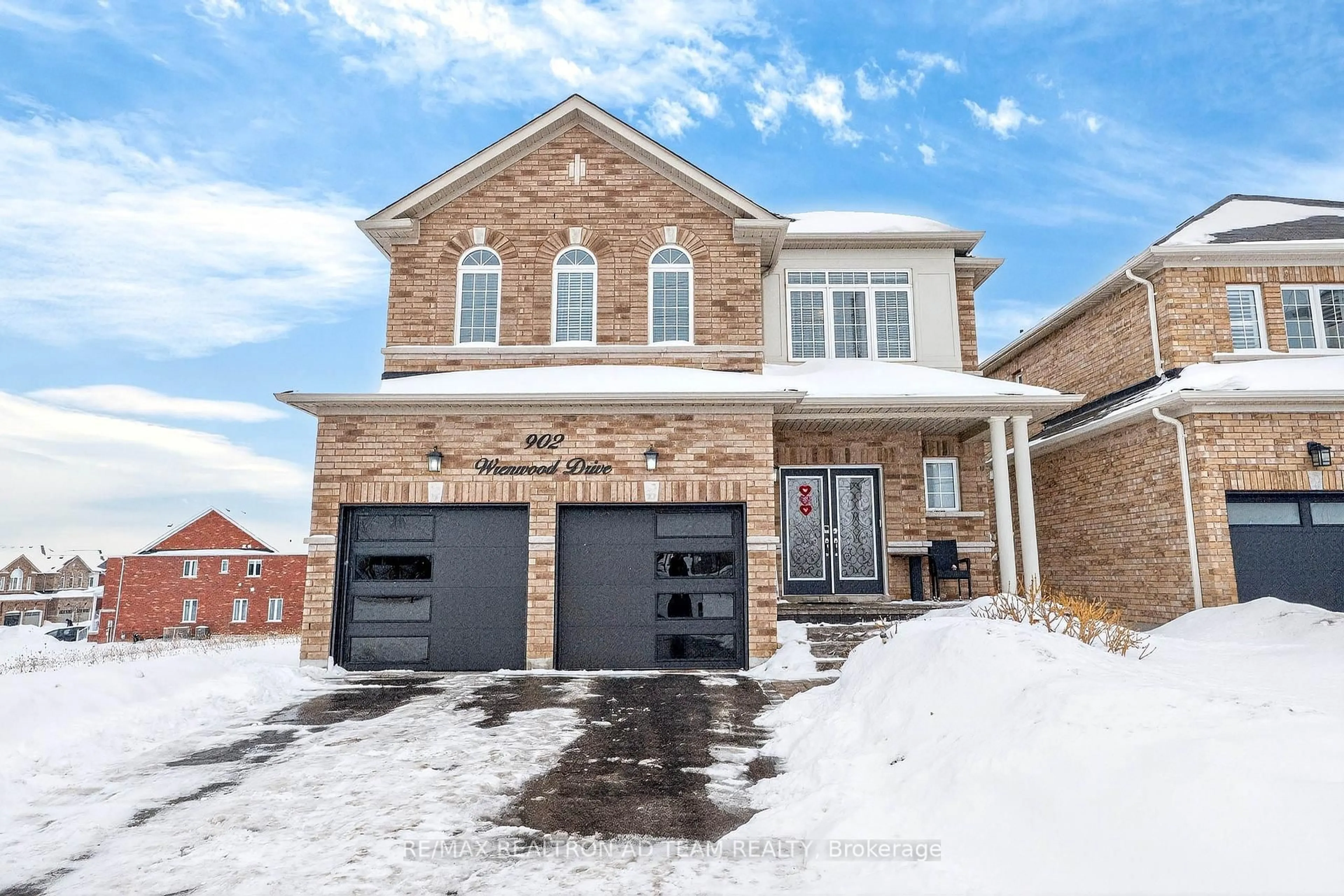 Home with brick exterior material, street for 902 Wrenwood Dr, Oshawa Ontario L1K 0W1
