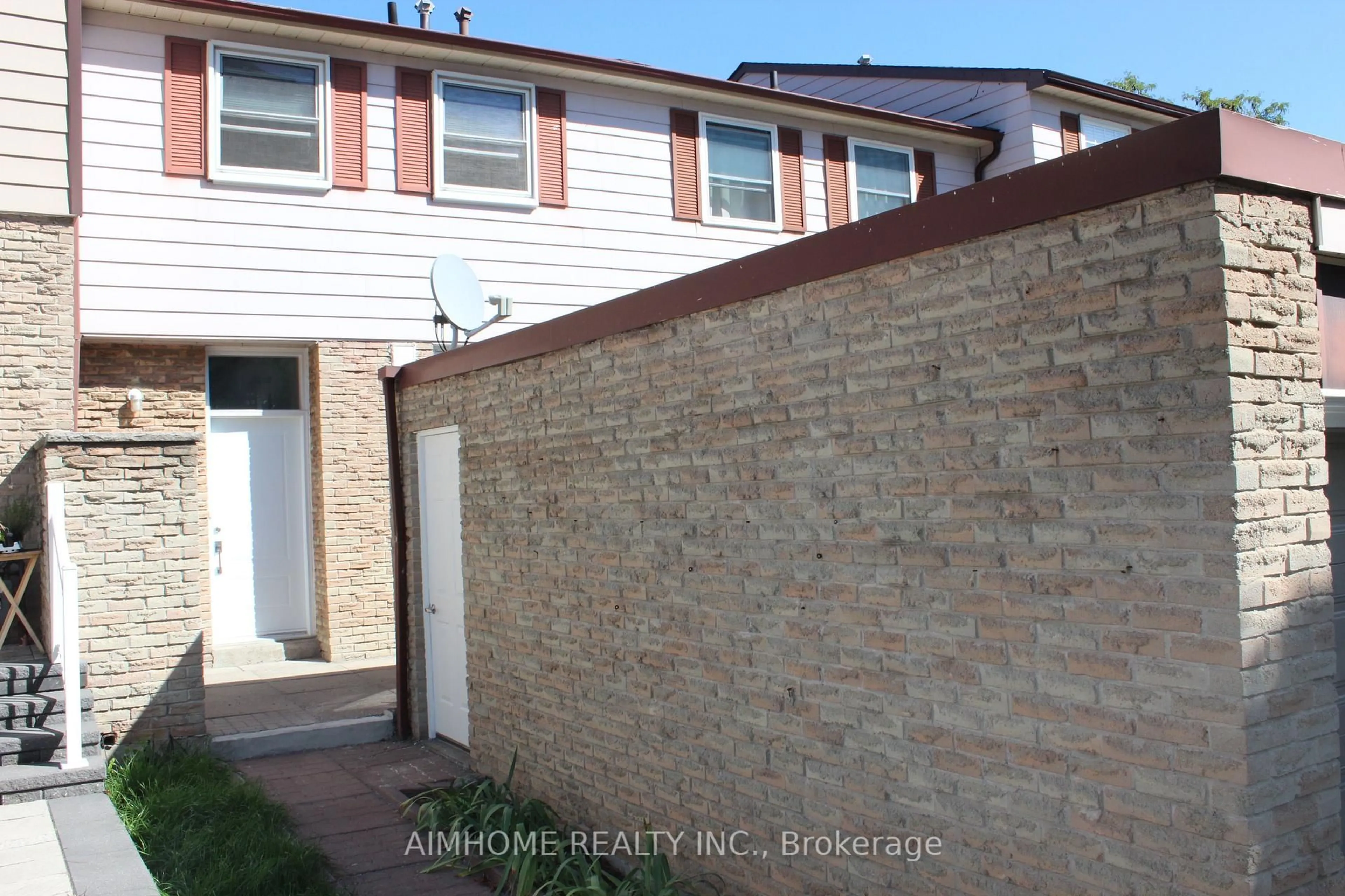 Home with brick exterior material, street for 2311 Bridletowne Circ, Toronto Ontario M1W 2L3