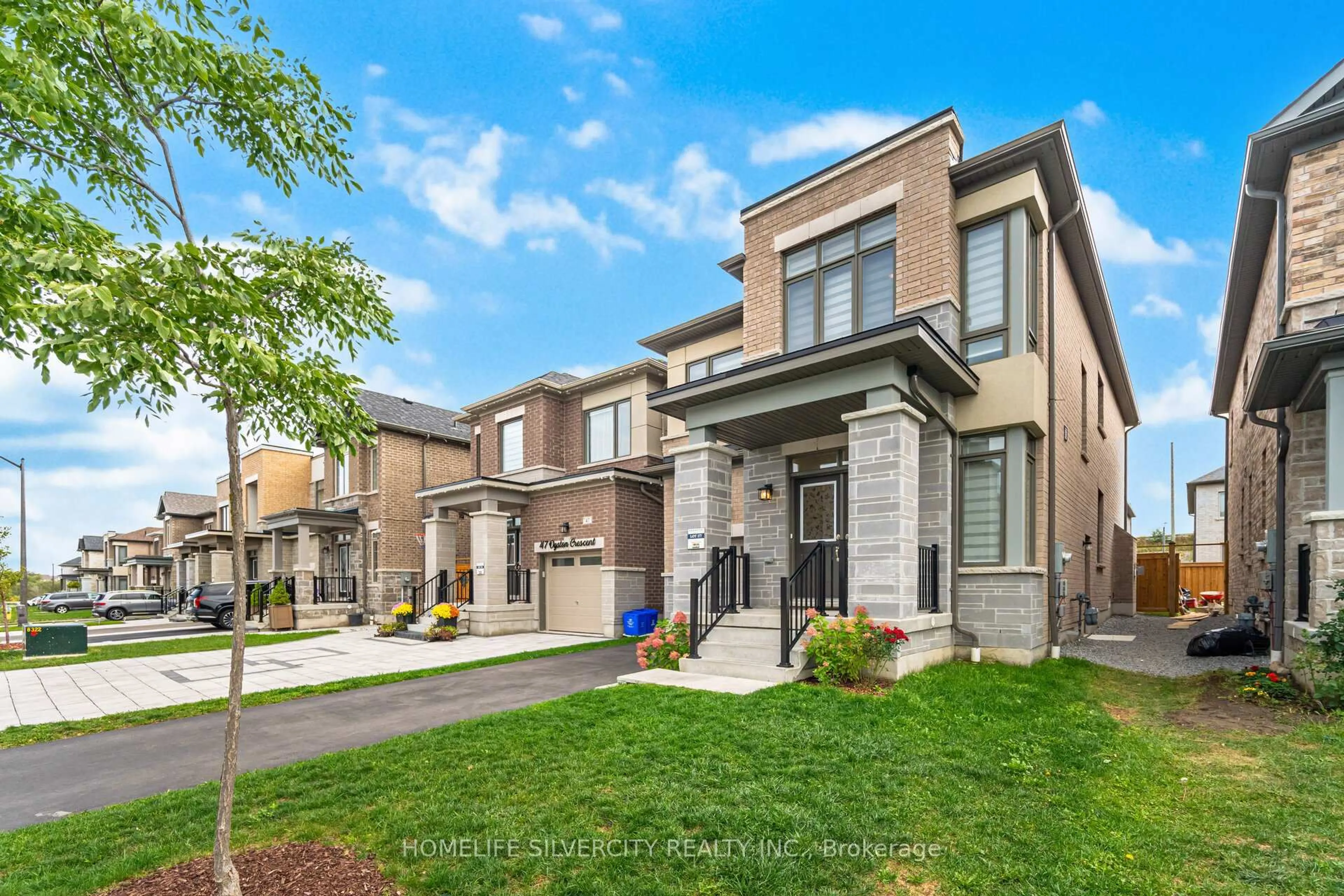 Home with brick exterior material, street for 45 Ogston Cres, Whitby Ontario L1P 0H2