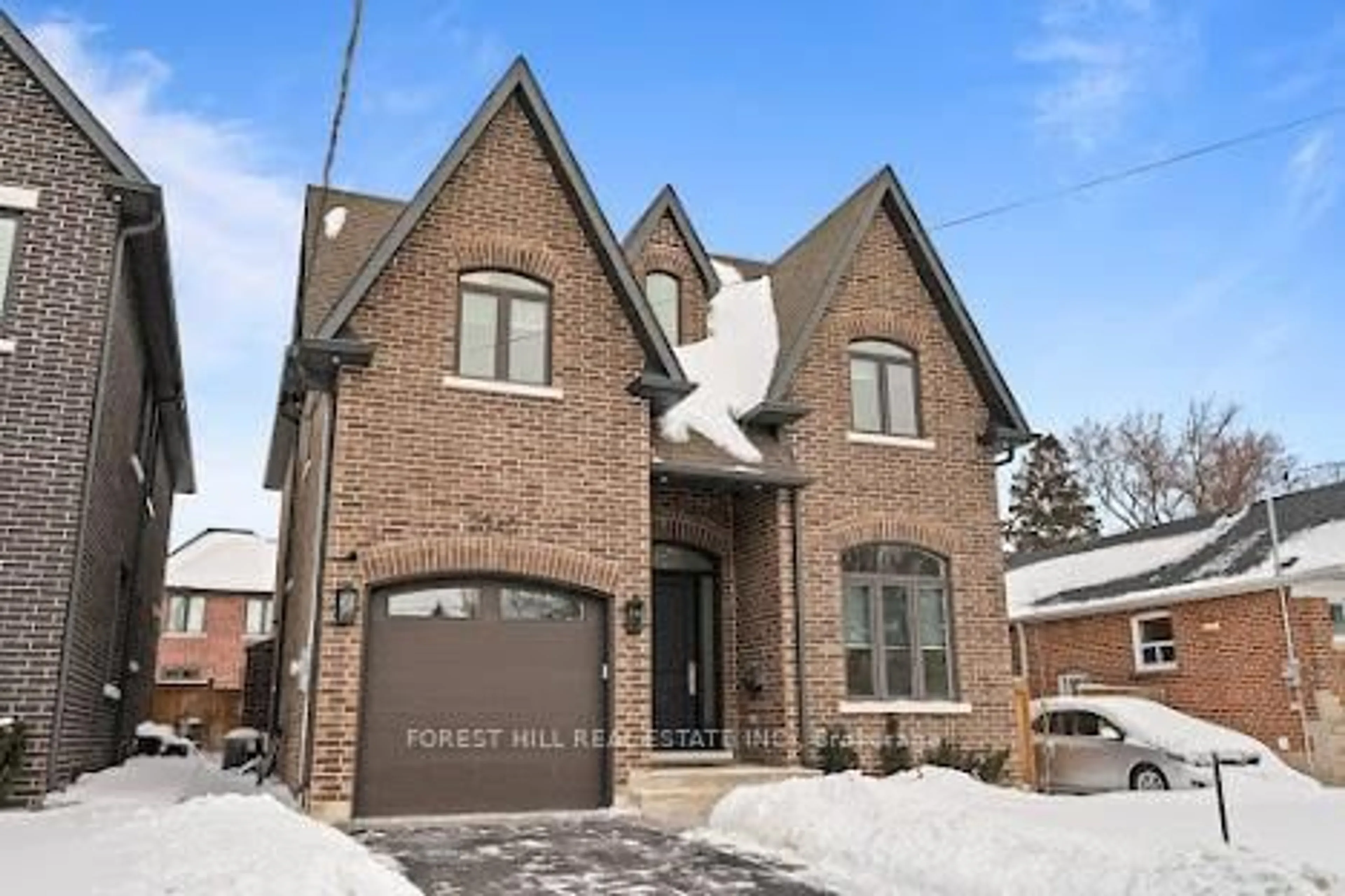 Home with brick exterior material, street for 2540 St Clair Ave, Toronto Ontario M4B 1M1