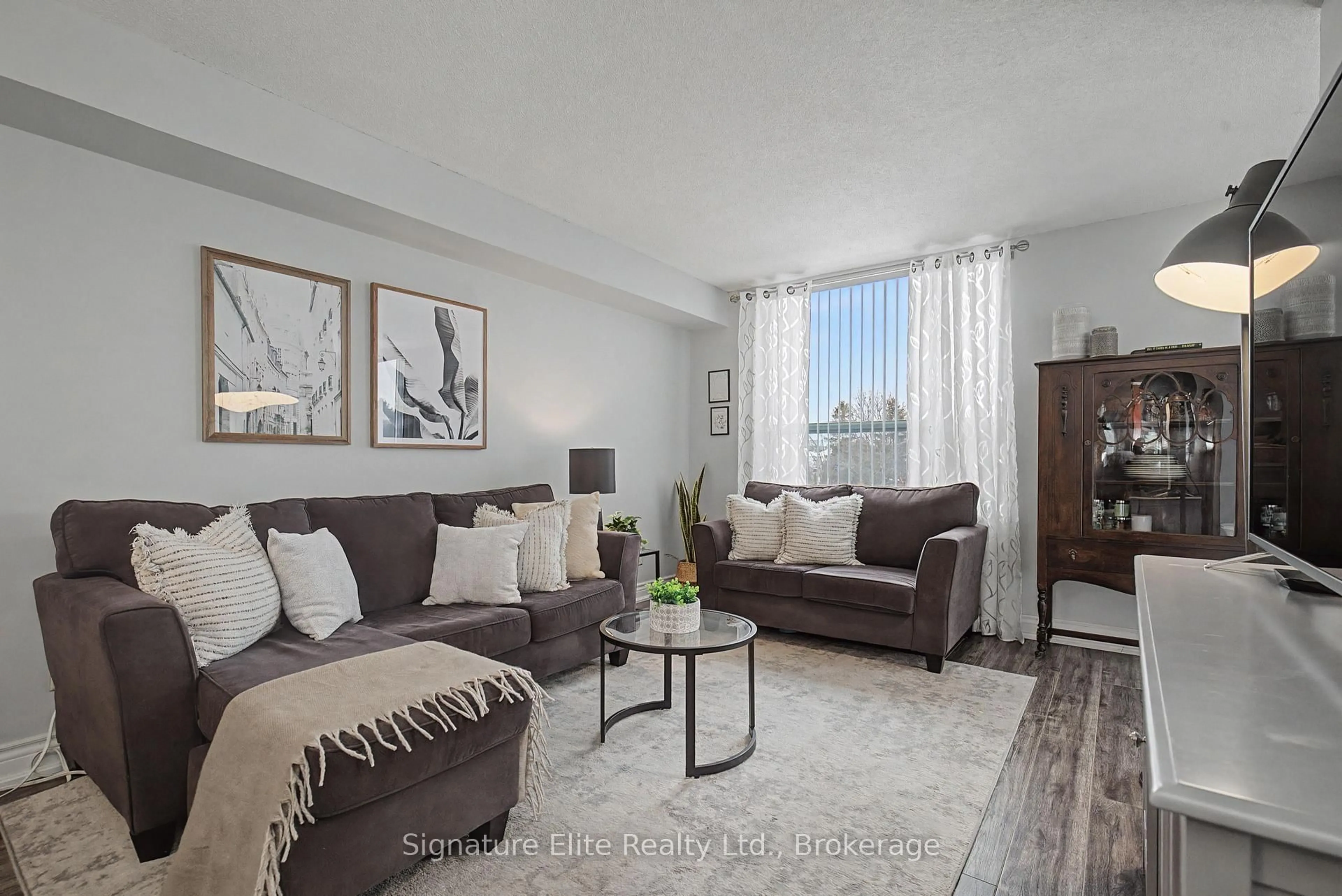 Living room with furniture, unknown for 1655 Pickering Pkwy #204, Pickering Ontario L1V 6L3