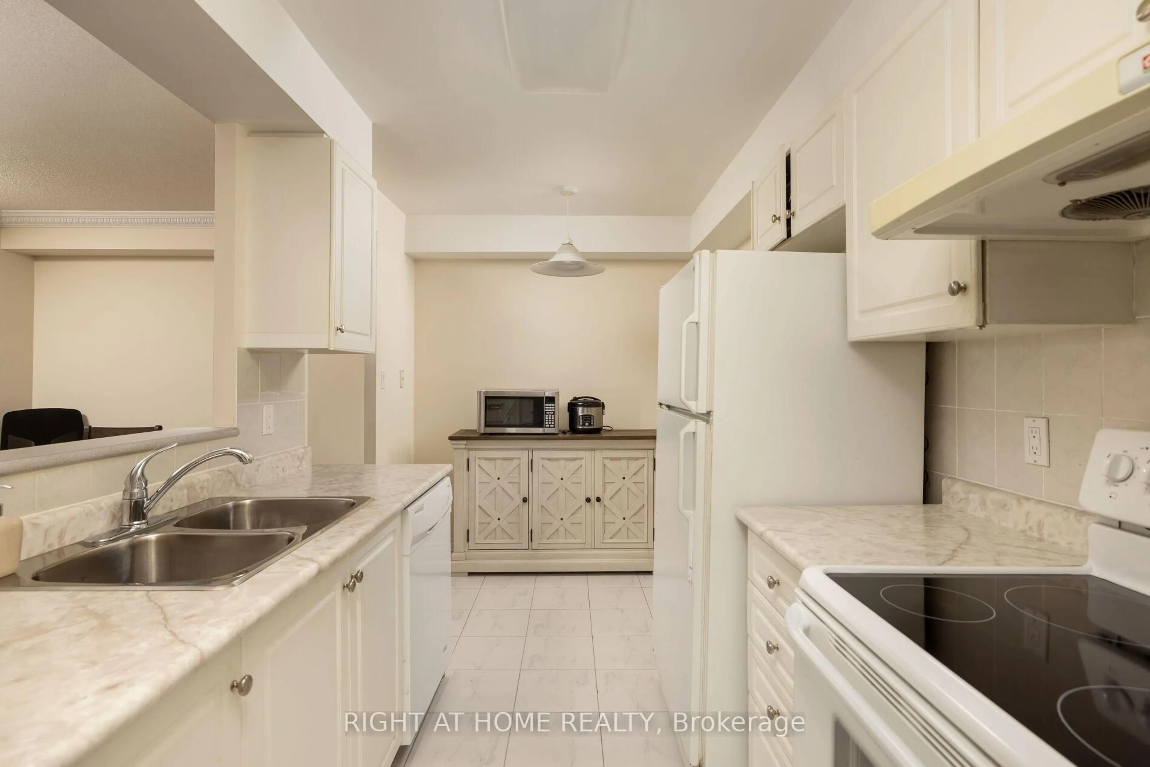 Standard kitchen, ceramic/tile floor for 1883 Mcnicoll Ave #227, Toronto Ontario M1V 5M3