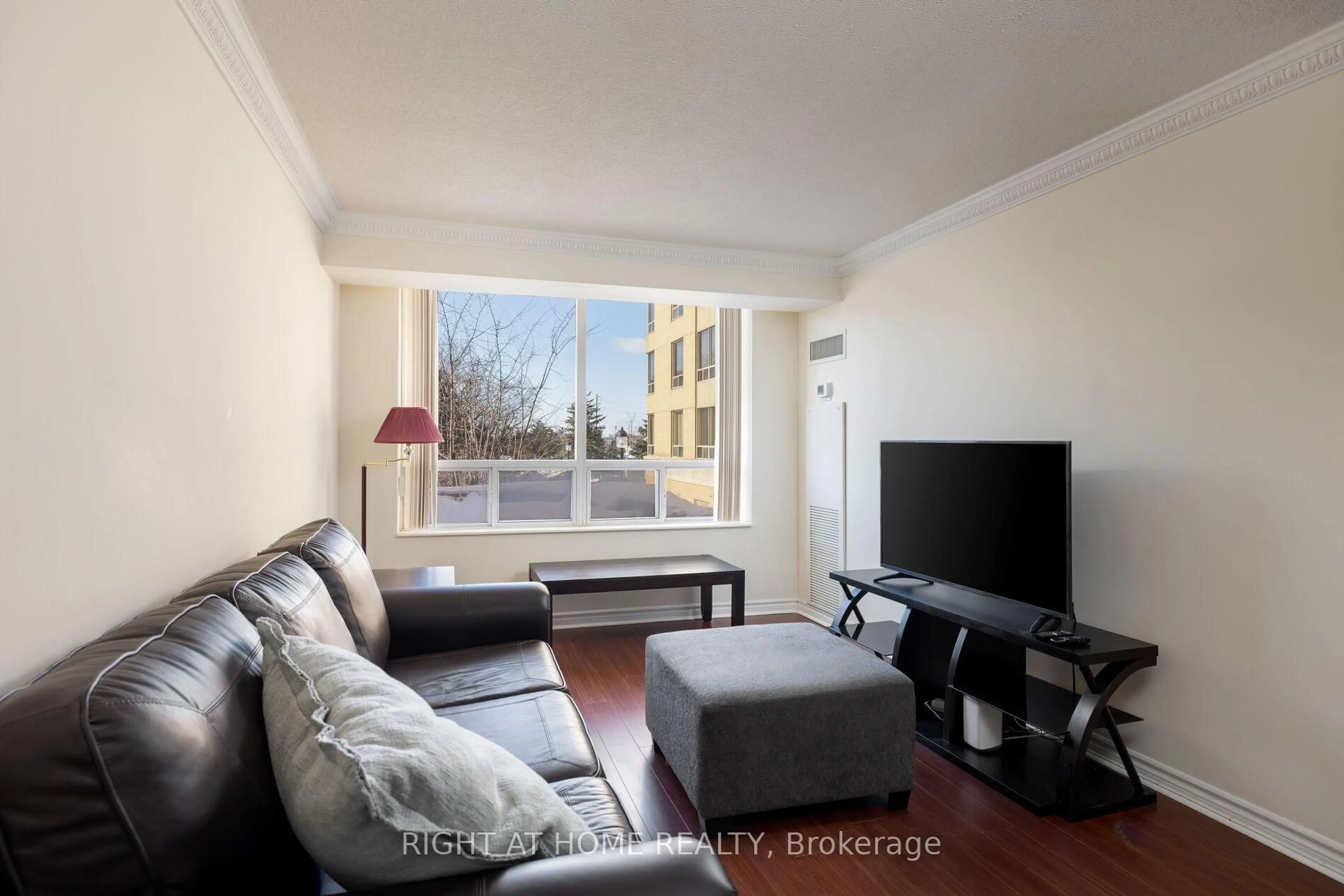 Living room with furniture, unknown for 1883 Mcnicoll Ave #227, Toronto Ontario M1V 5M3