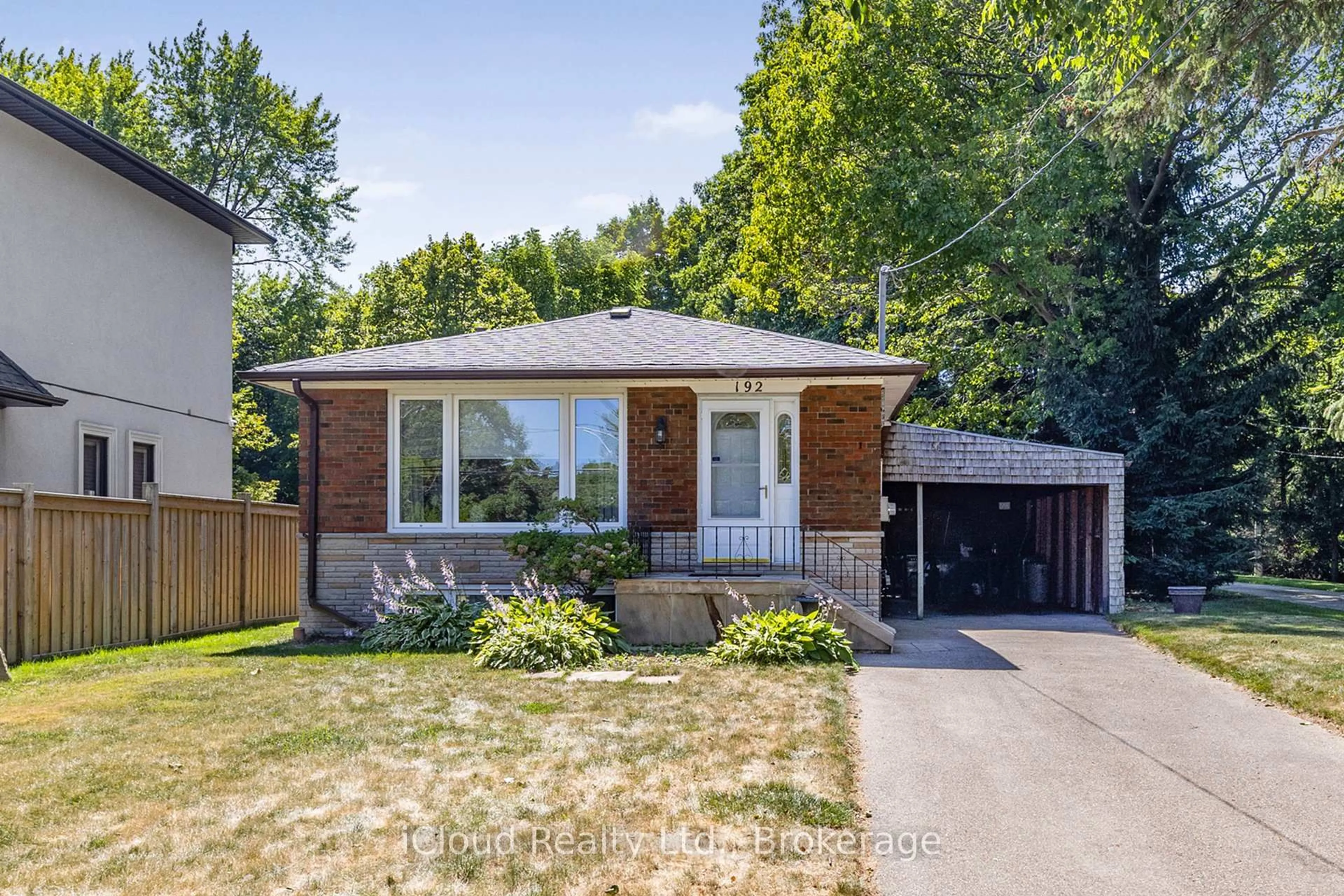 Home with brick exterior material, street for 192 Beechgrove Dr, Toronto Ontario M1E 3Z5