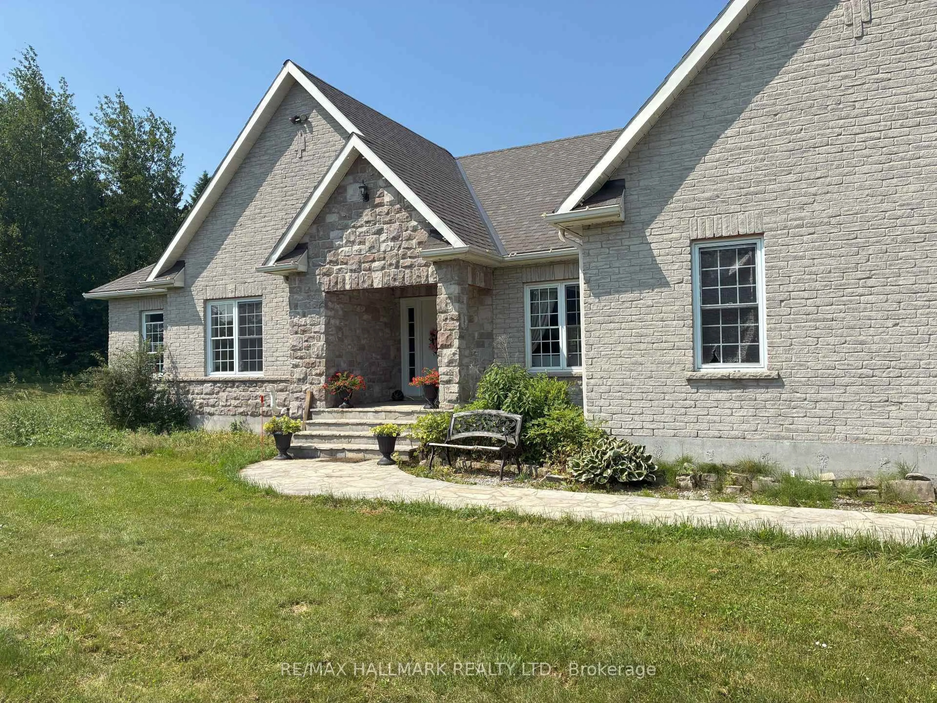 Home with brick exterior material, unknown for 11110 Simcoe St, Scugog Ontario L9L 1B3