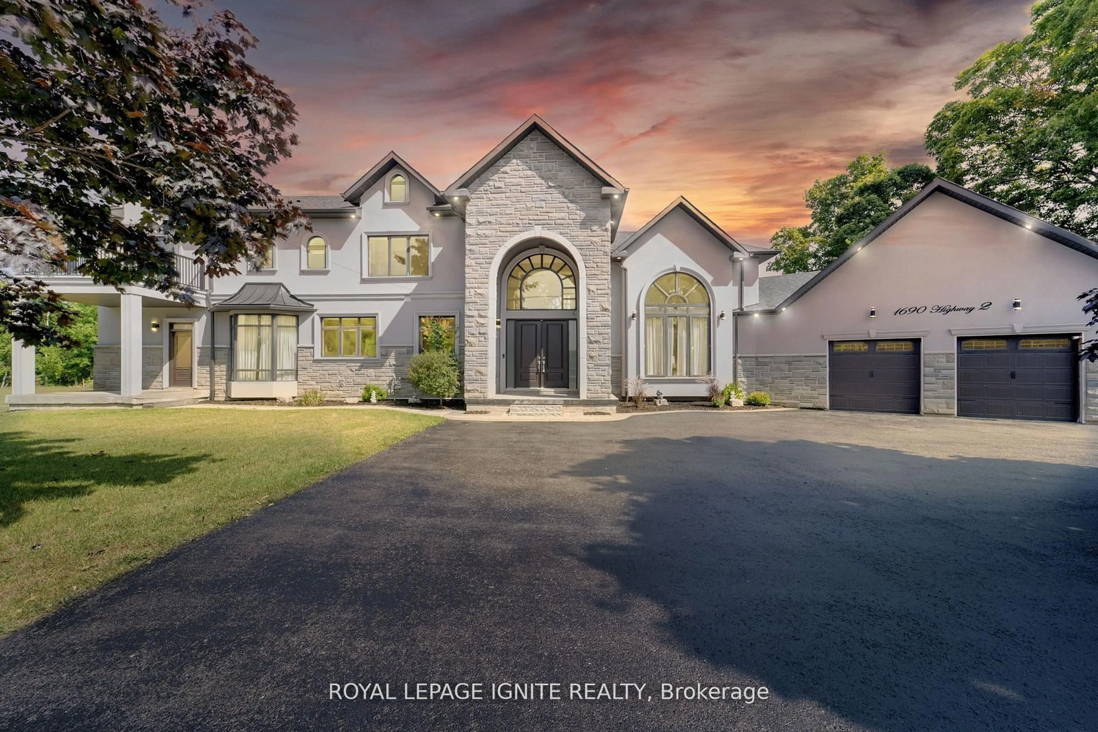 A pic from outside/outdoor area/front of a property/back of a property/a pic from drone, street for 1690 Highway 2 Rd, Clarington Ontario L1E 3R6